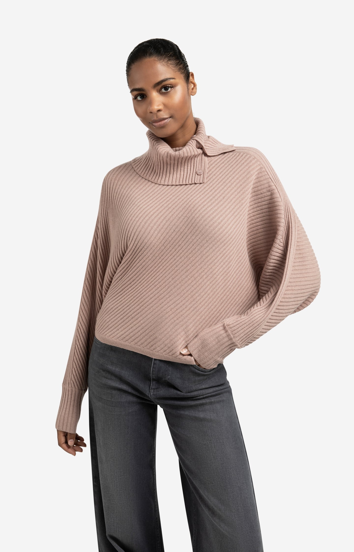Ribbed sweater with batwing sleeves and high collar