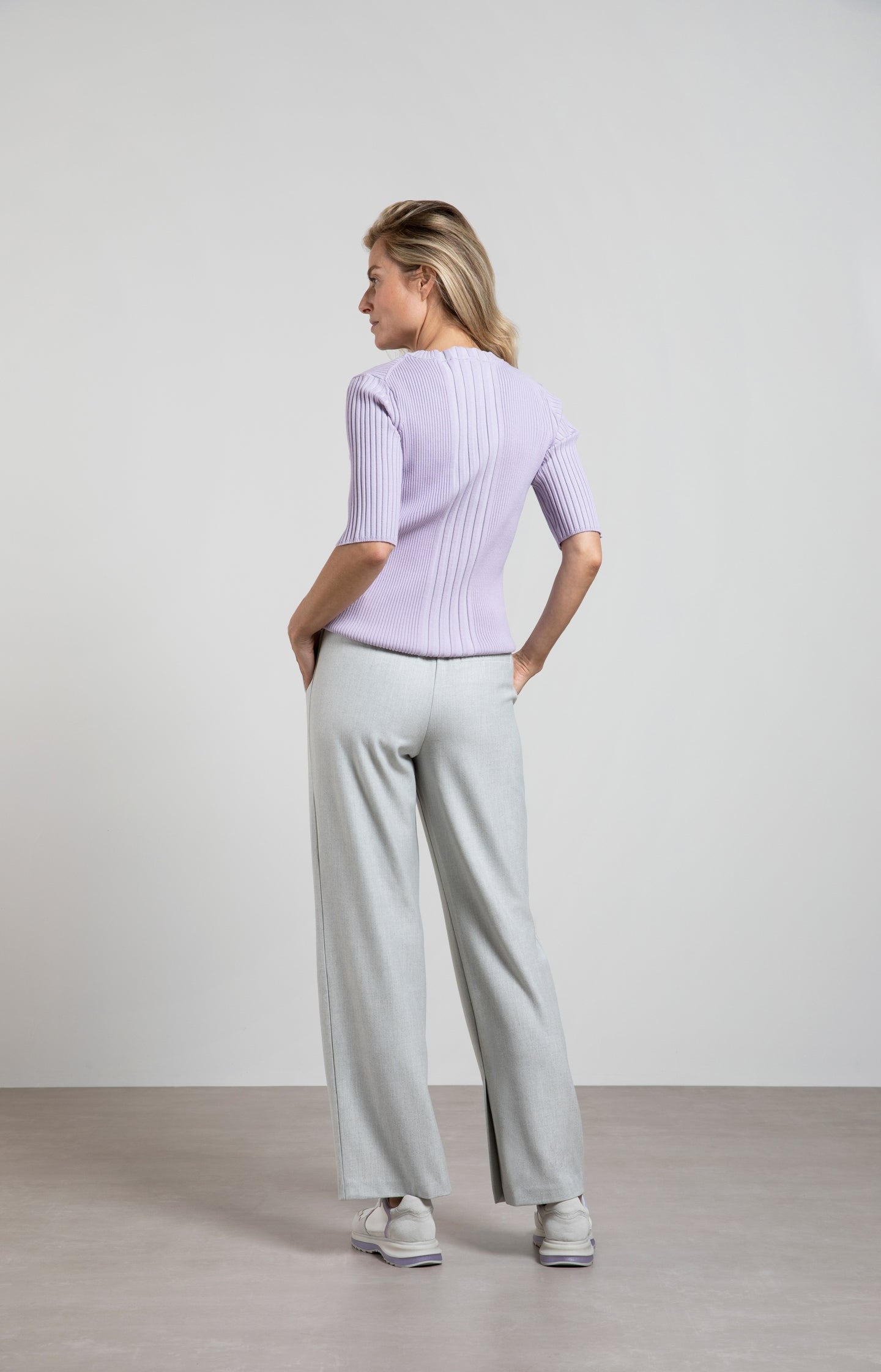 Ribbed sweater with crewneck, half sleeves and slit detail