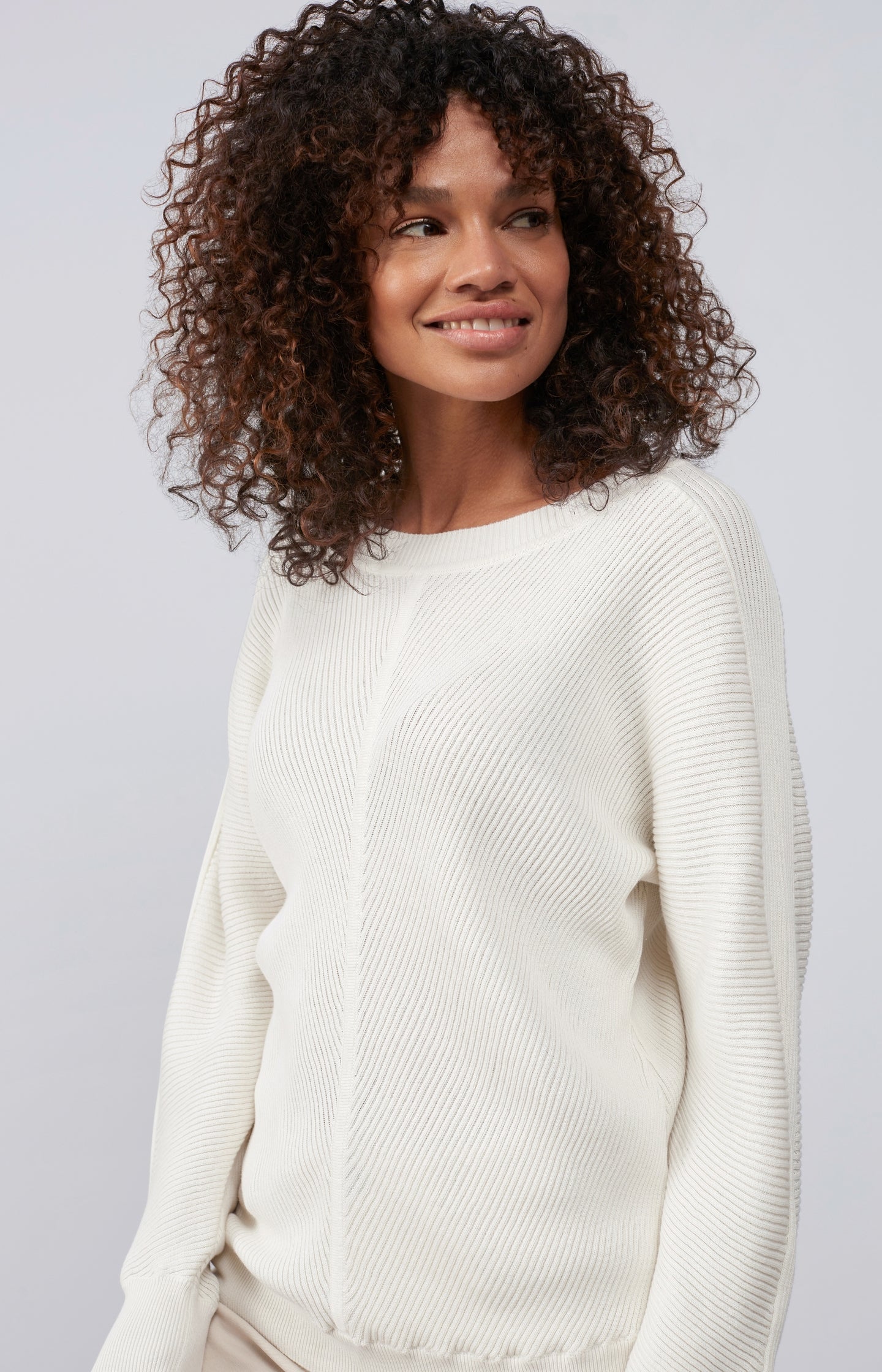 Ribbed sweater with round neck, long sleeves and seam detail