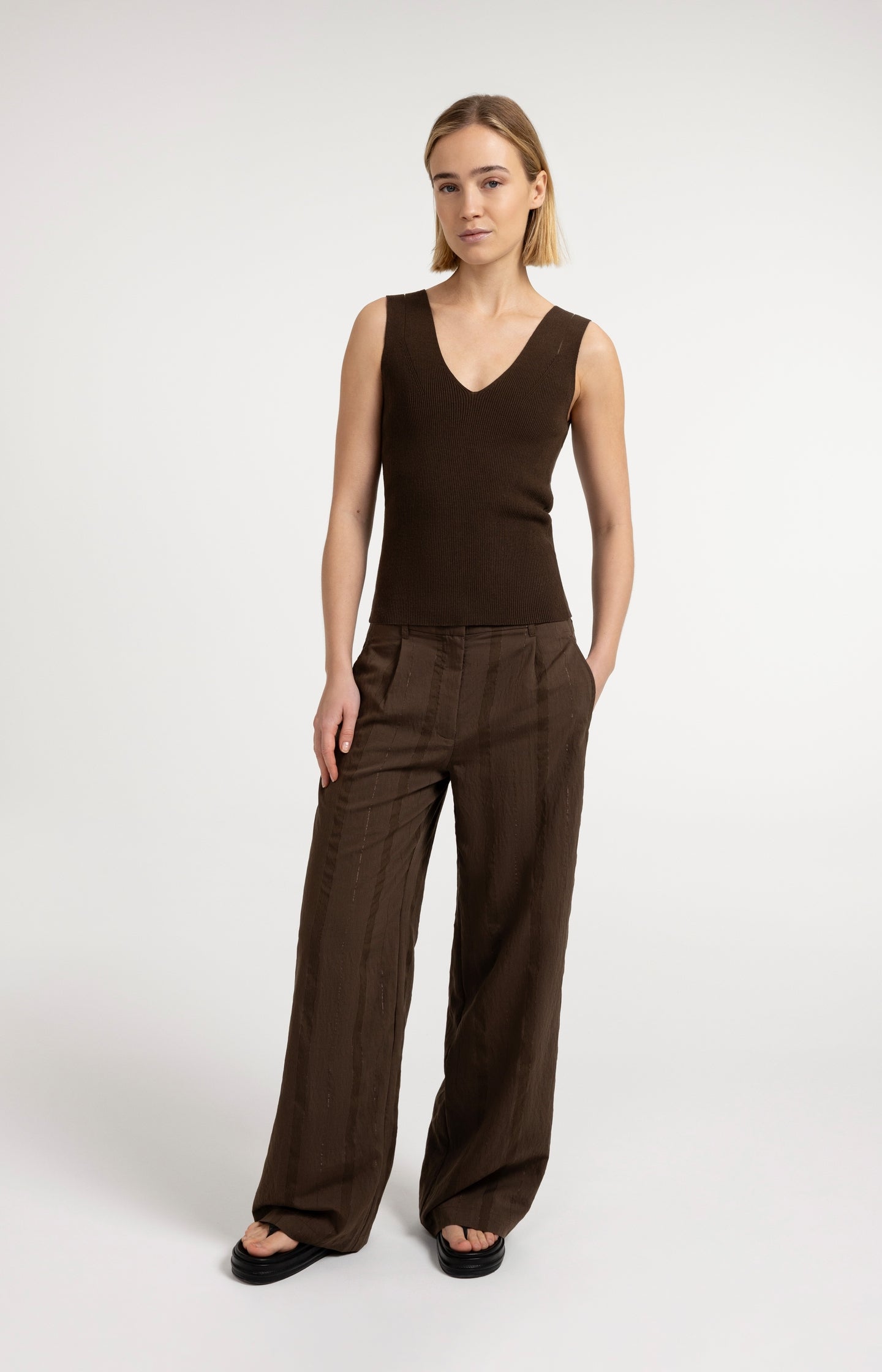 Ribbed top with V-neck and shoulder details