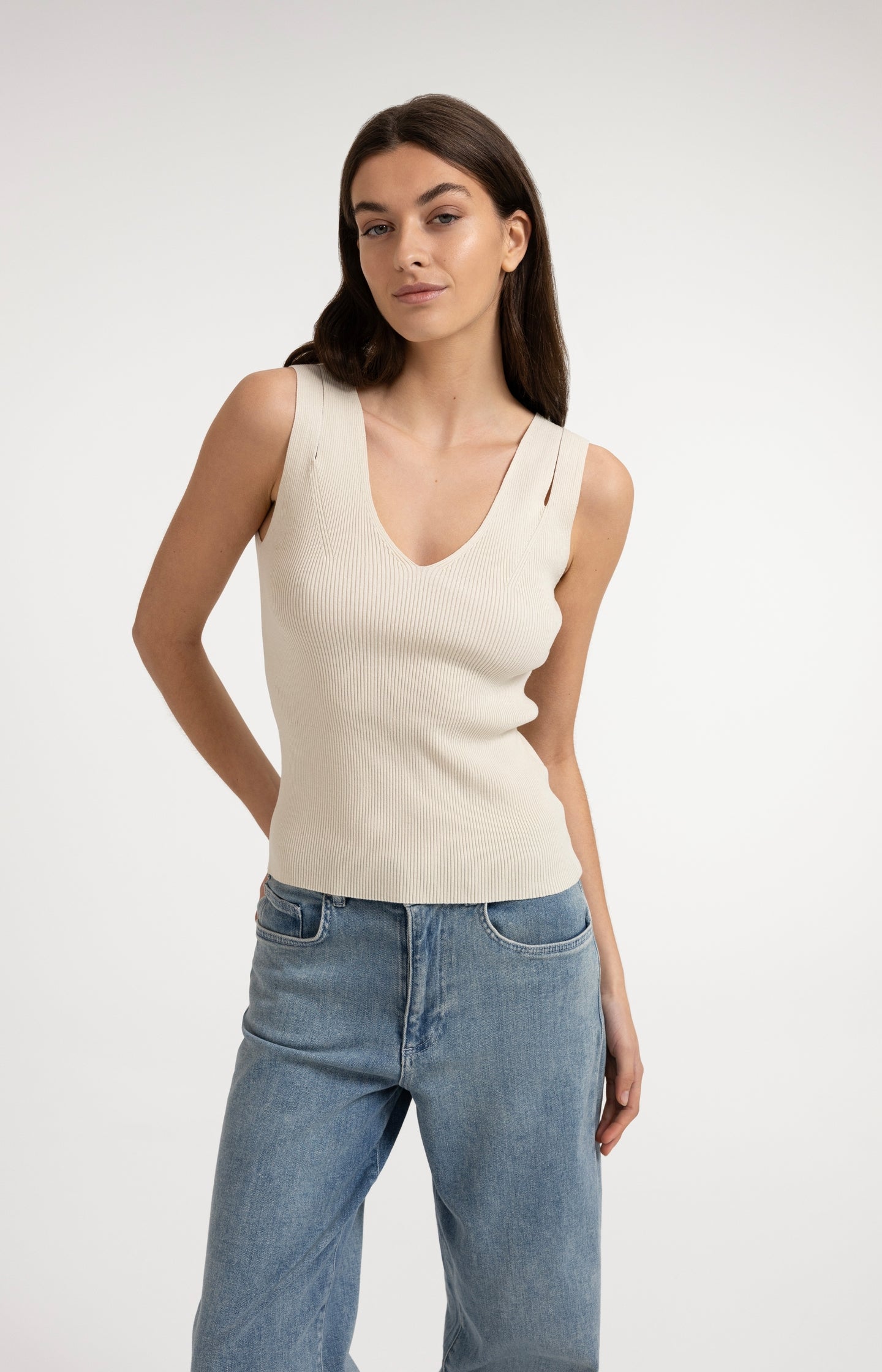 Ribbed top with V-neck and shoulder details