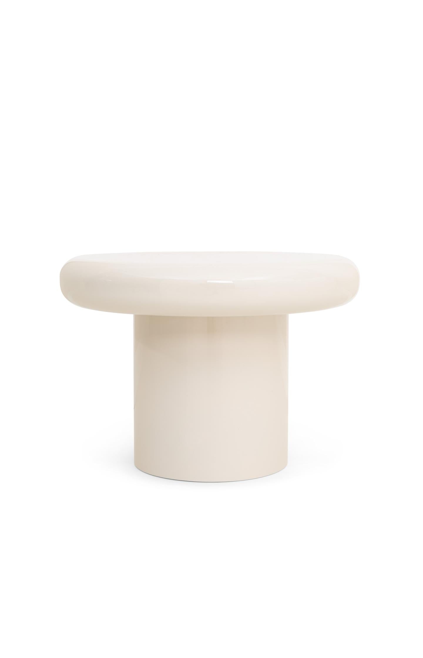 Round coffee table with glossy finish