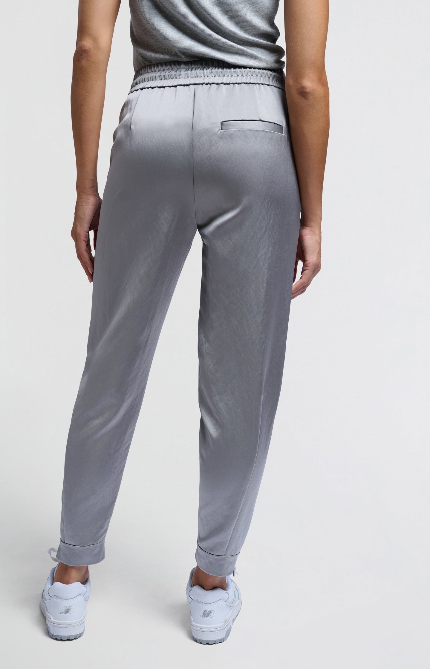 Satin joggers with zipper details and elastic waistband