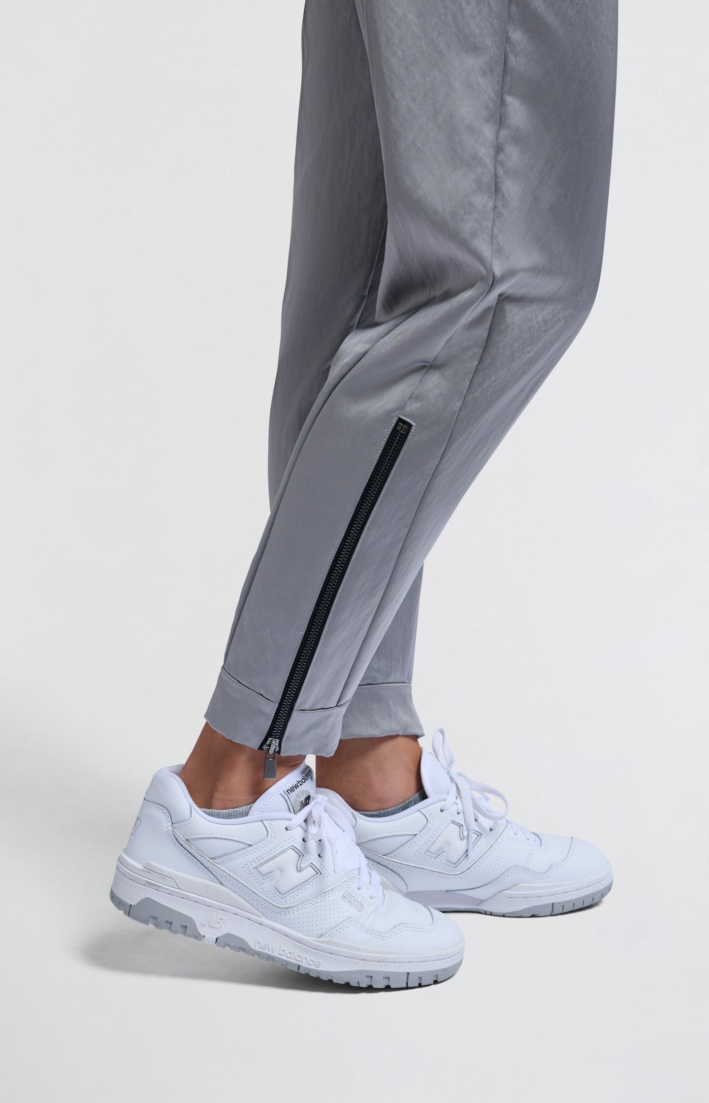 Satin joggers with zipper details and elastic waistband