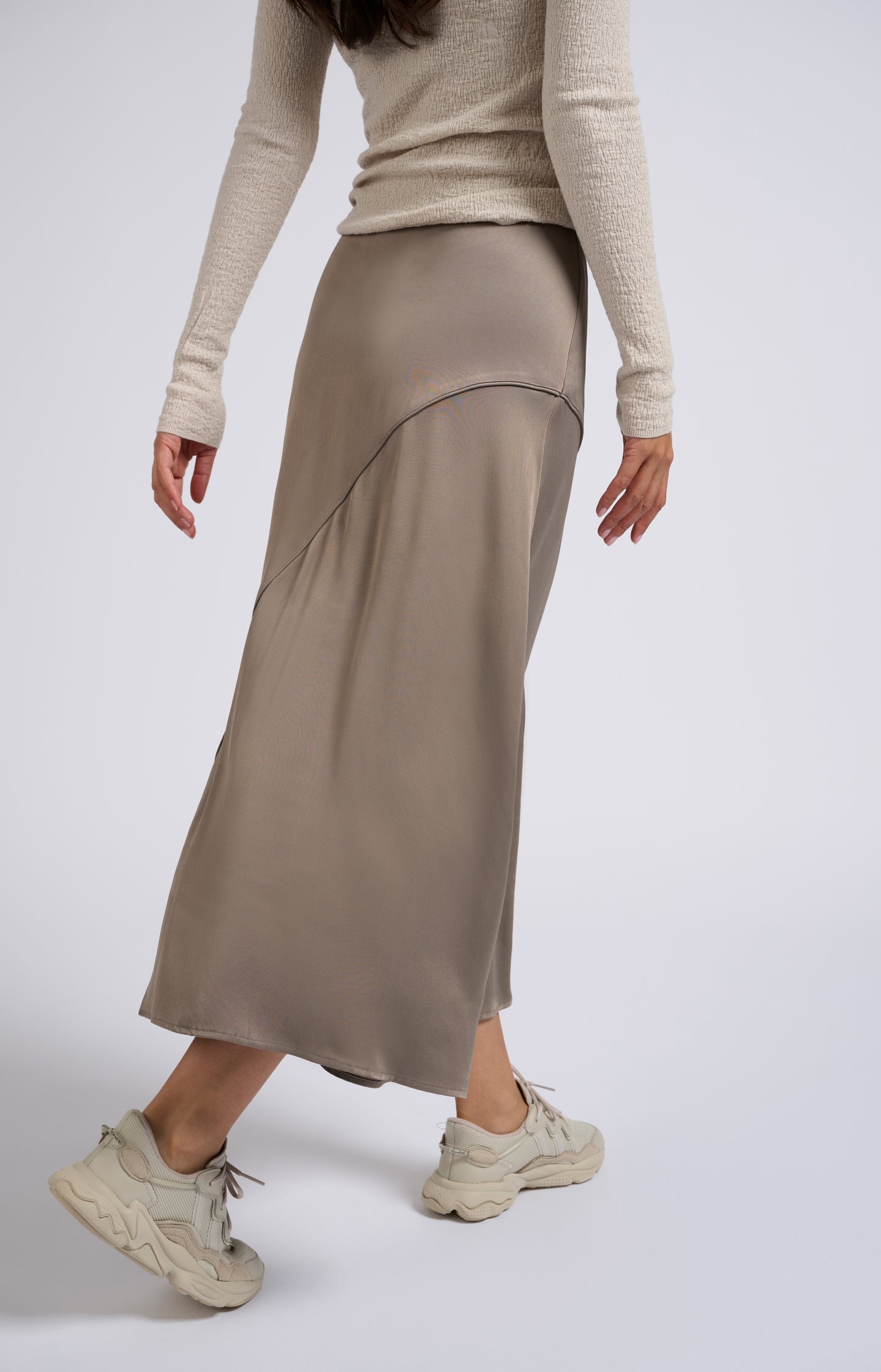 Satin midi A-line skirt with subtle asymmetric seam and belt