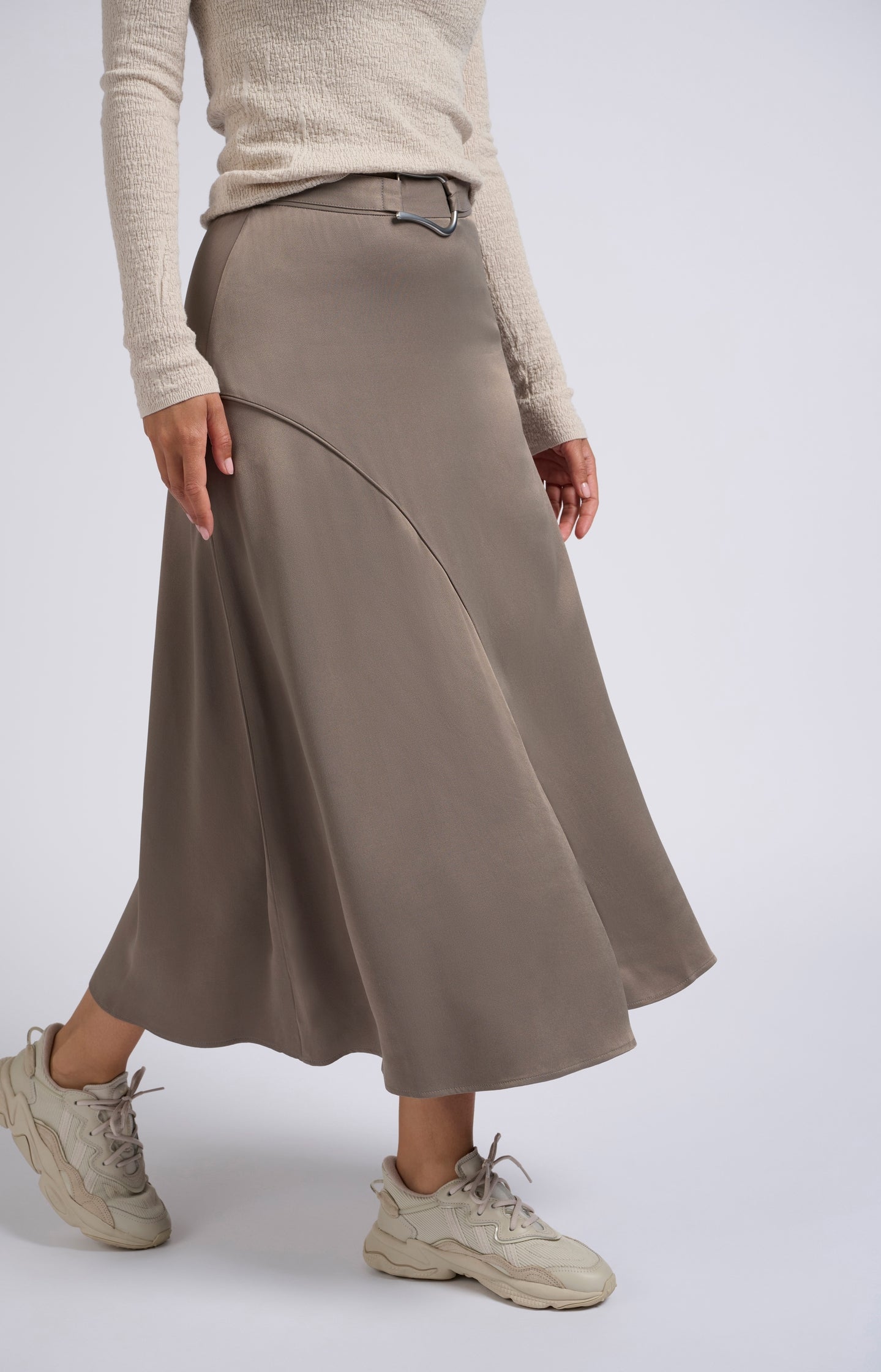 Satin midi A-line skirt with subtle asymmetric seam and belt