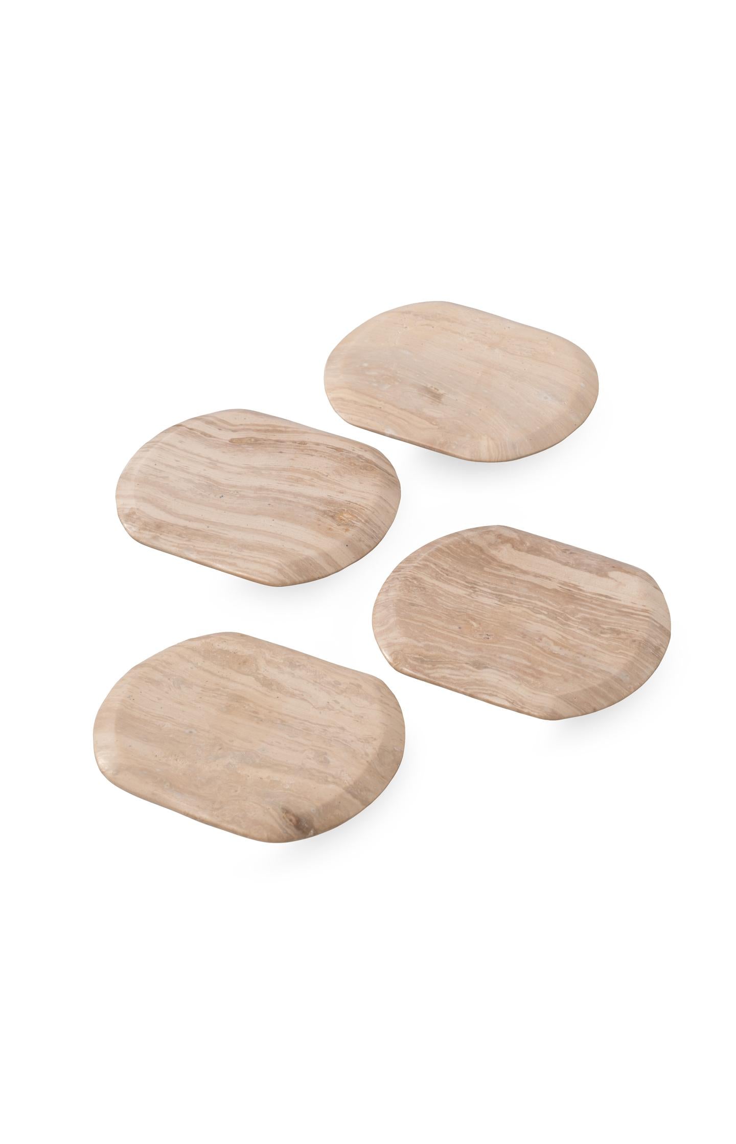 Set of four oval marble coasters