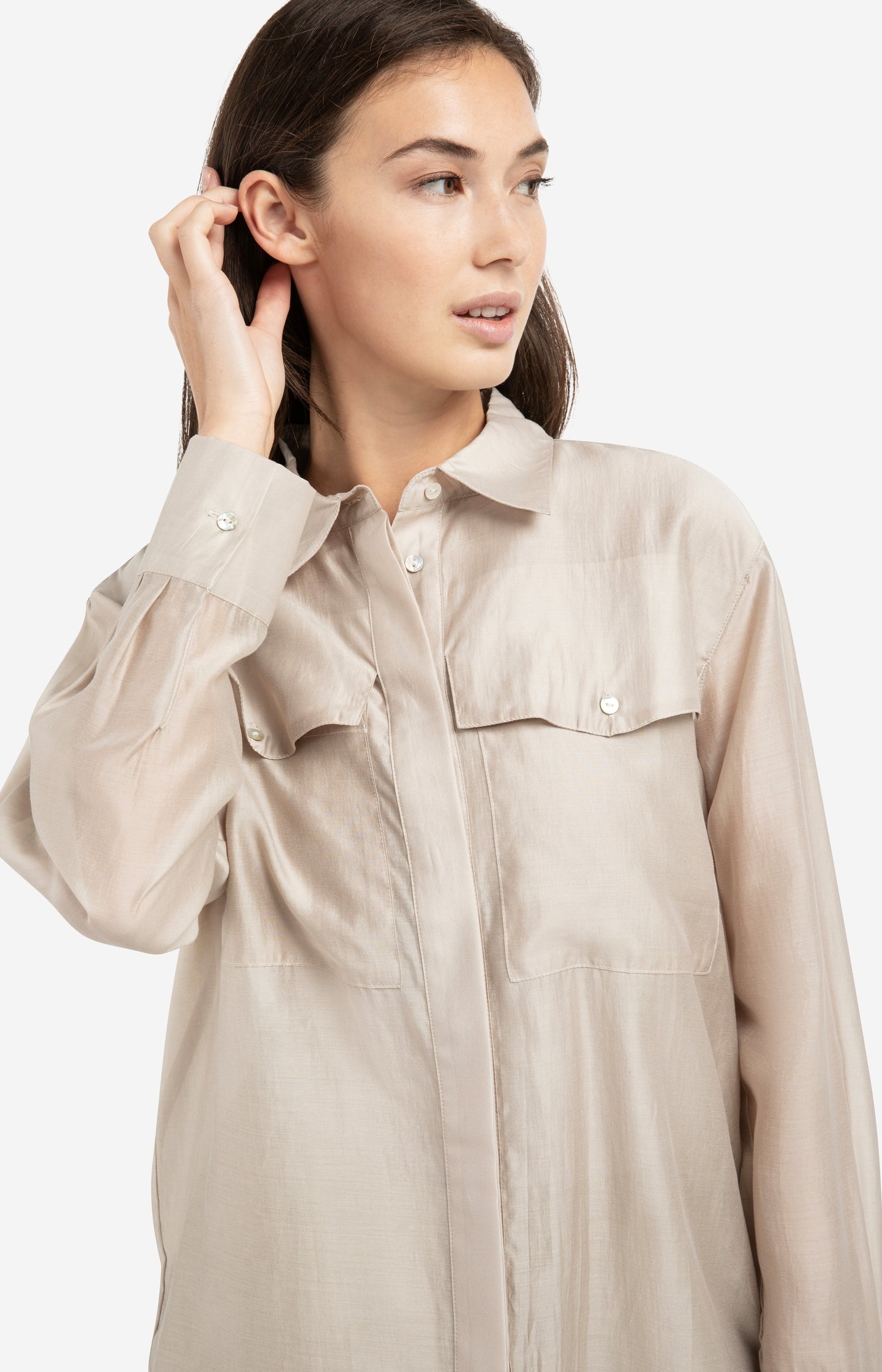Sheer blouse with chest pockets