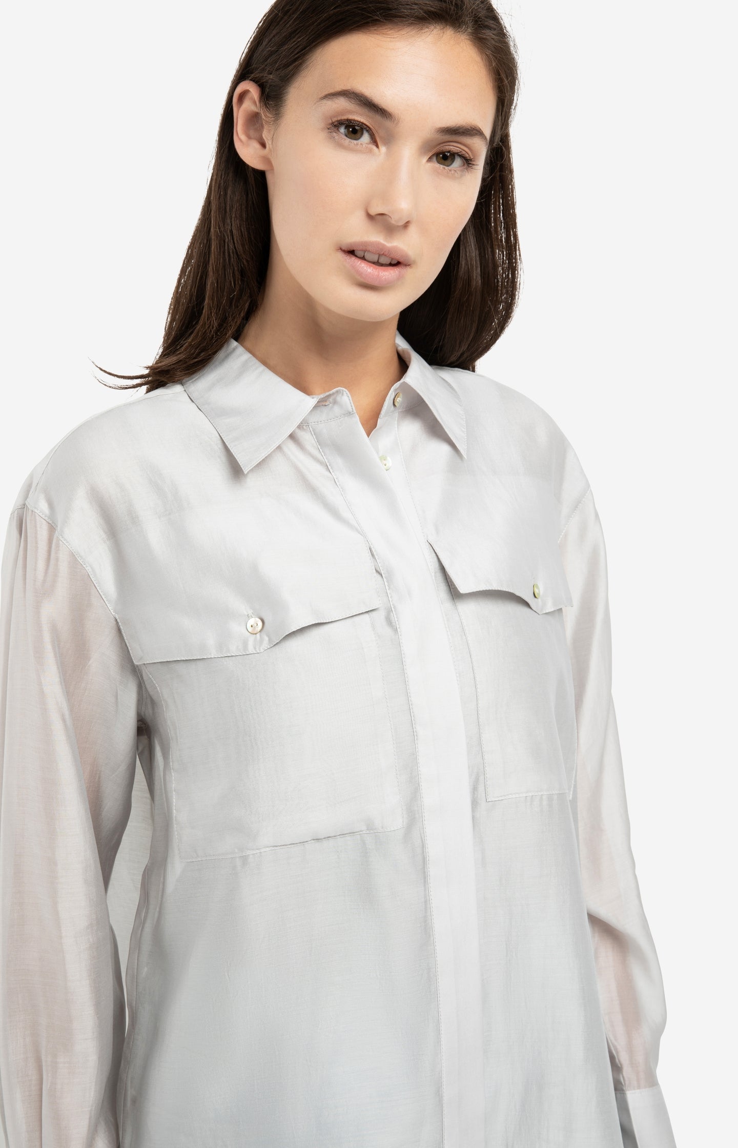 Sheer blouse with chest pockets