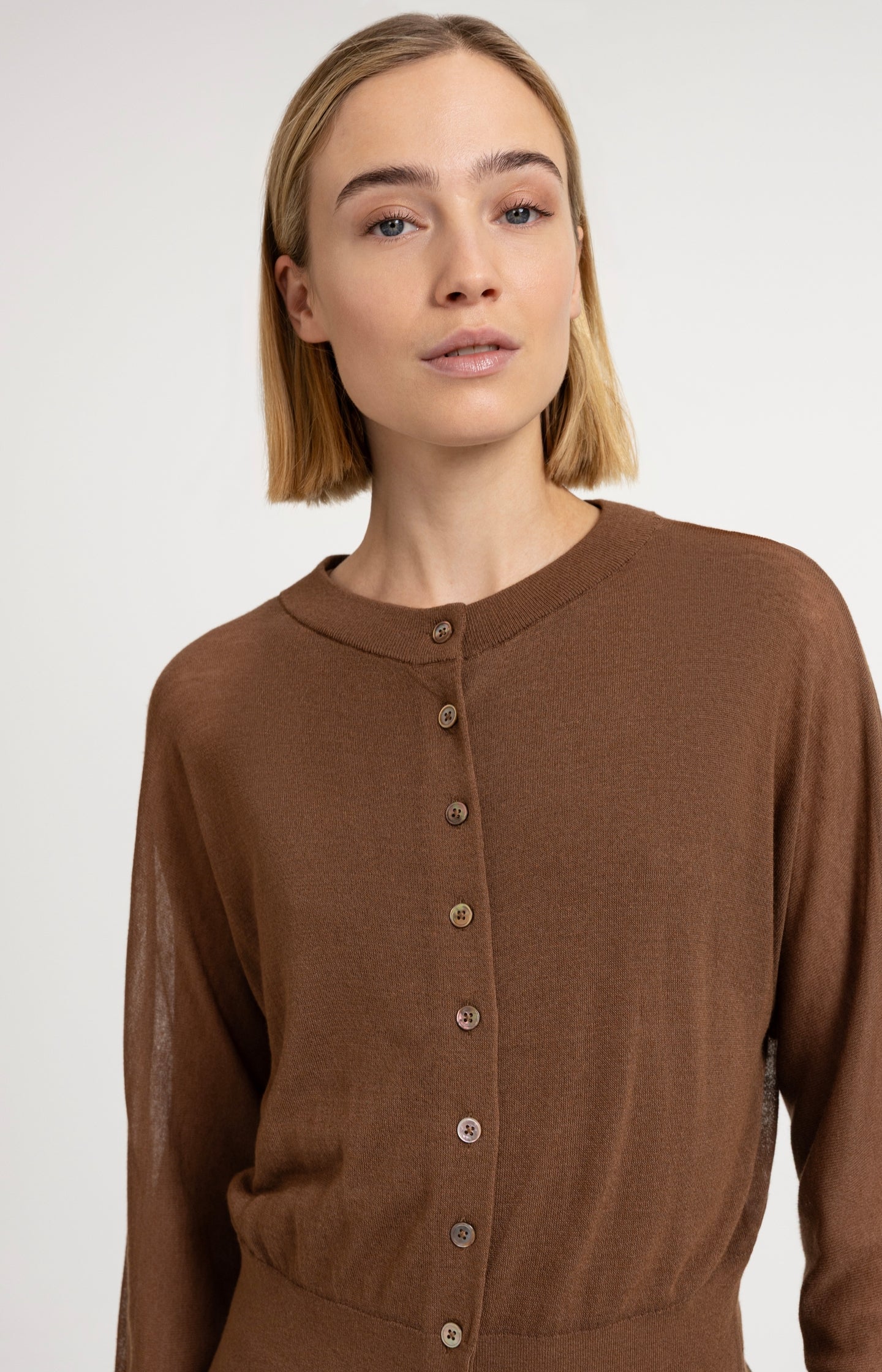 Sheer cardigan with batwing sleeves and tank top