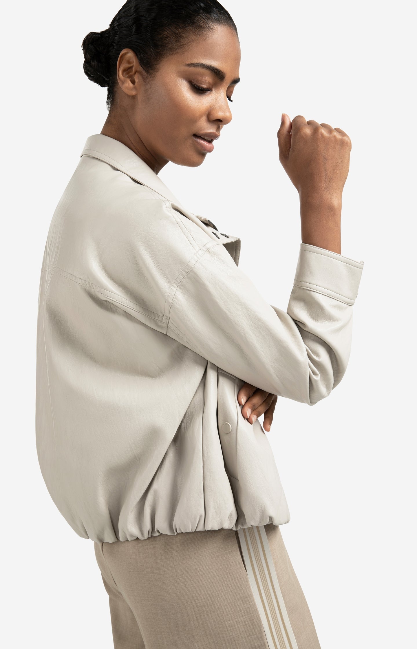 Short faux leather jacket with elastic hem