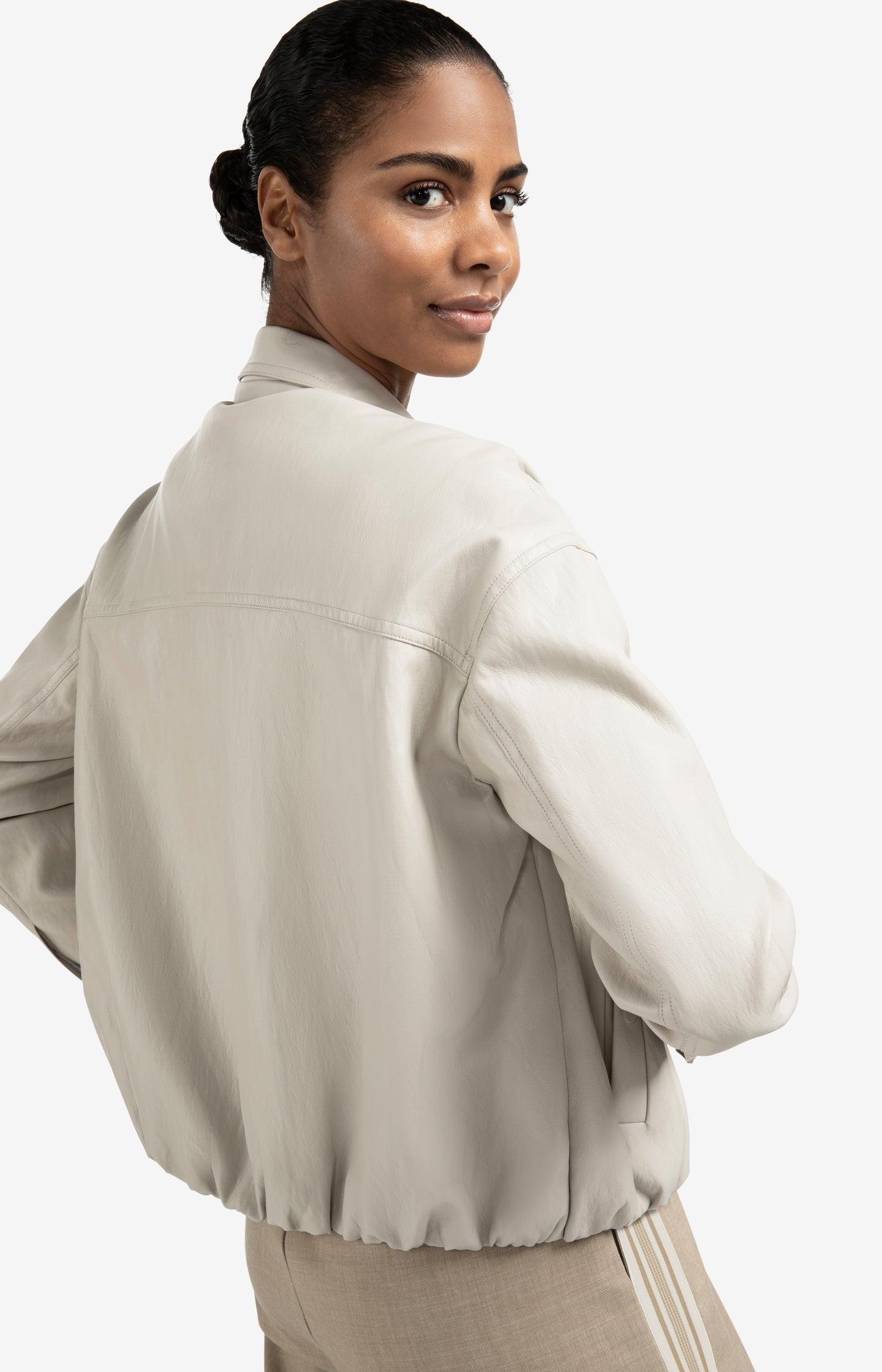 Short faux leather jacket with elastic hem