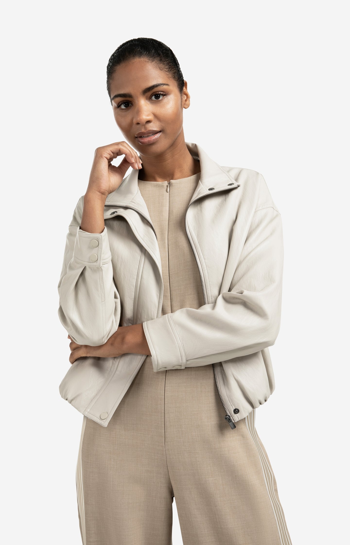 Short faux leather jacket with elastic hem
