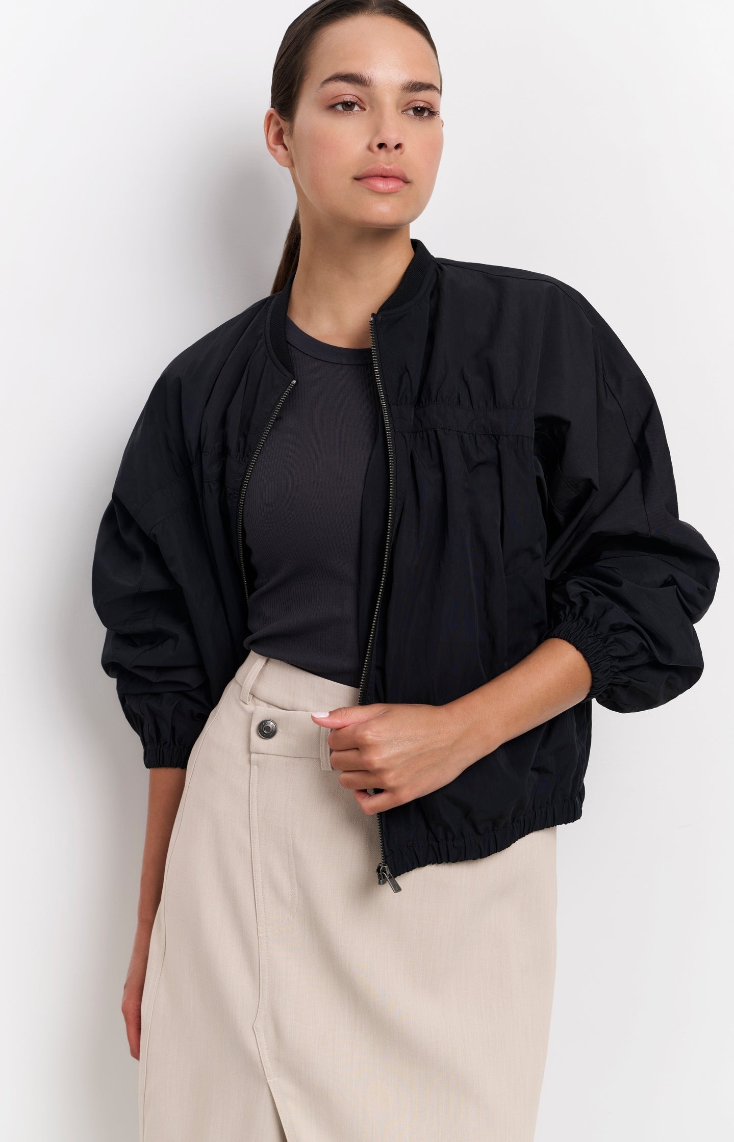 Short nylon bomber jacket with oversized fit