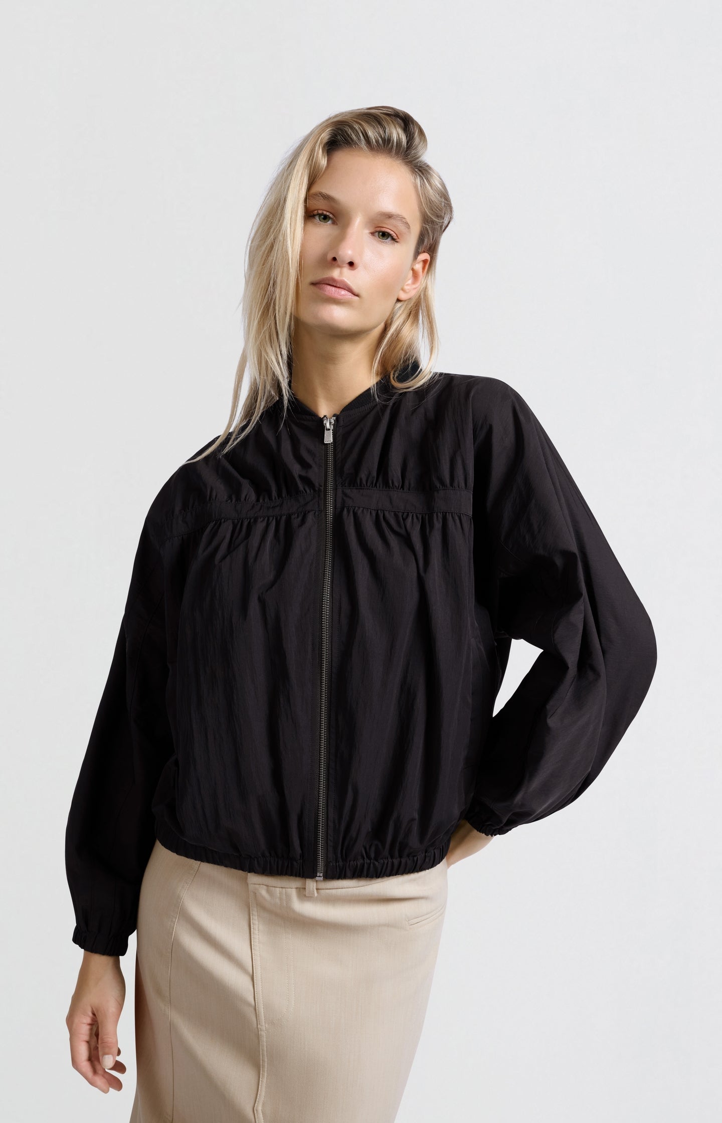 Short nylon bomber jacket with oversized fit