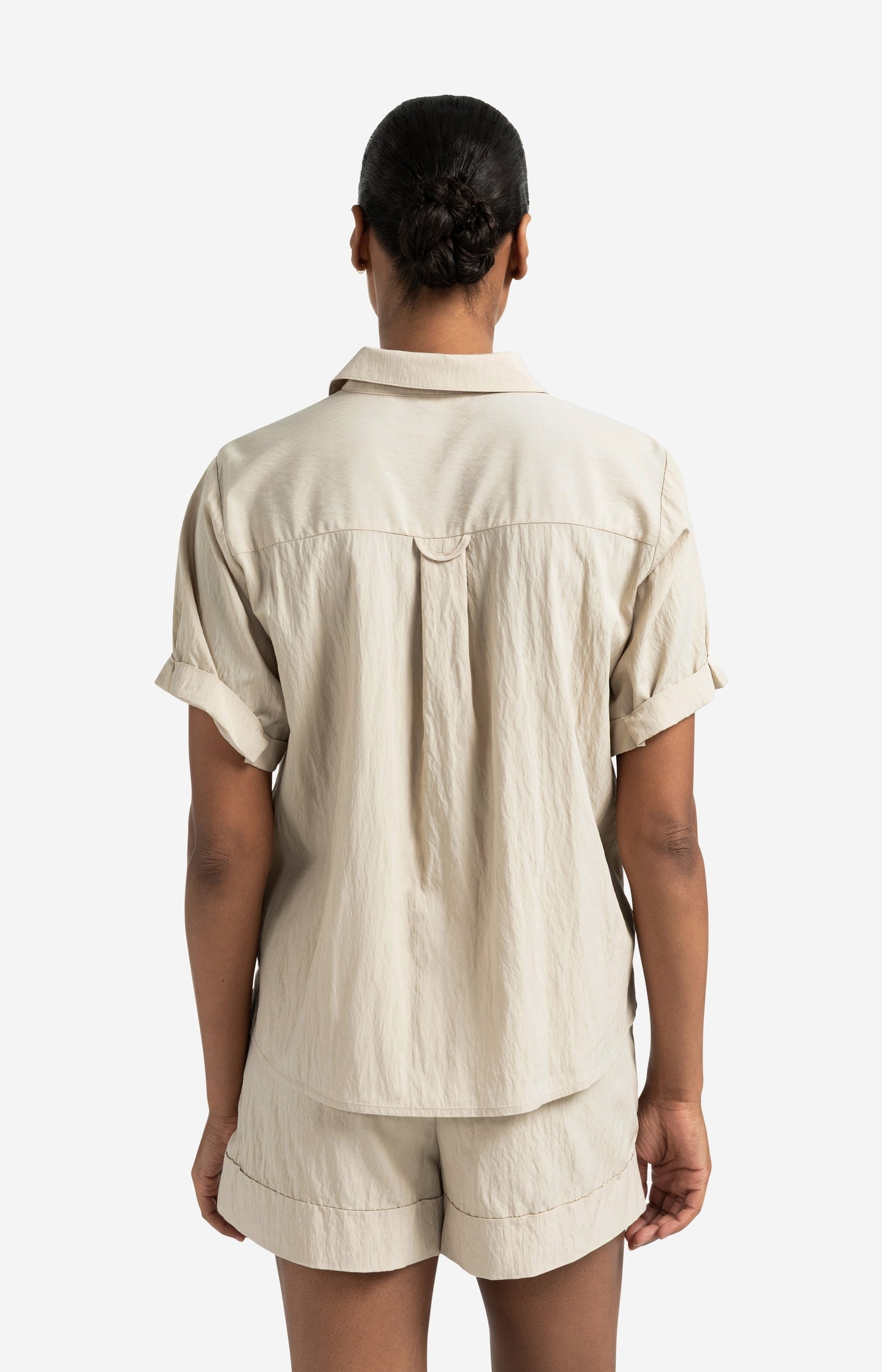 Short sleeve blouse with refined placket detail