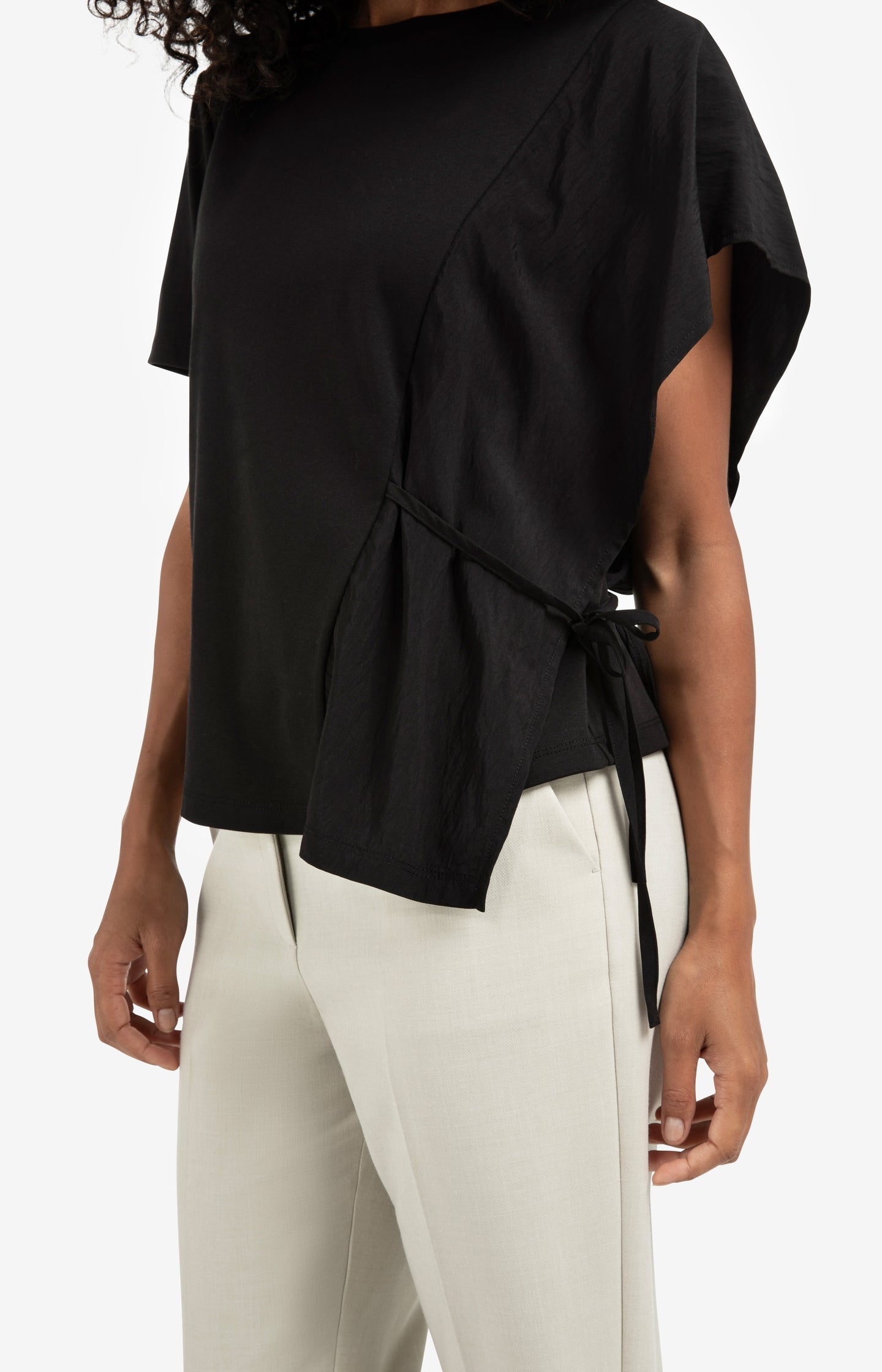 Short sleeve top with tie detail and fabric mix