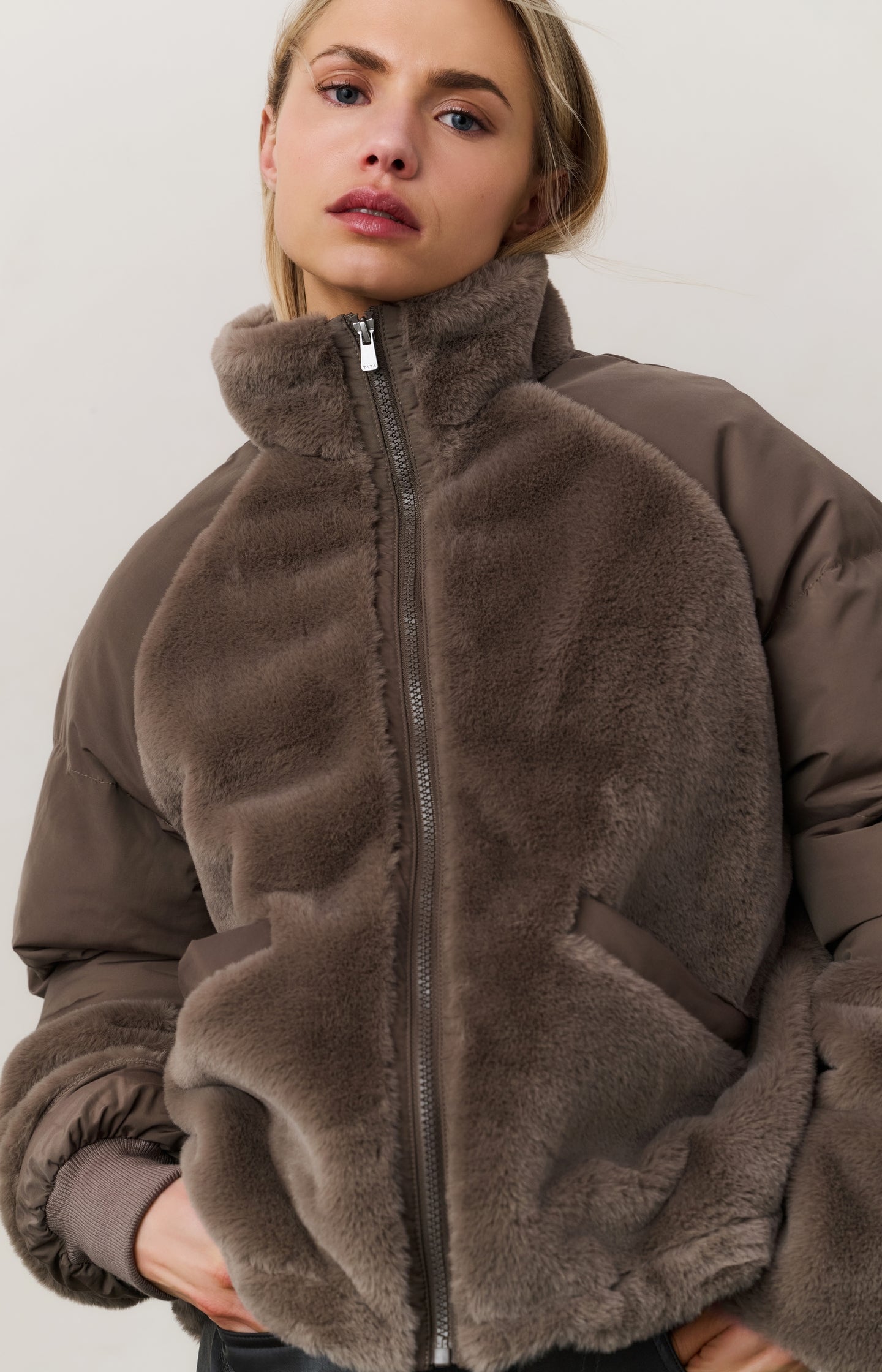 Short teddy jacket with padded sleeves