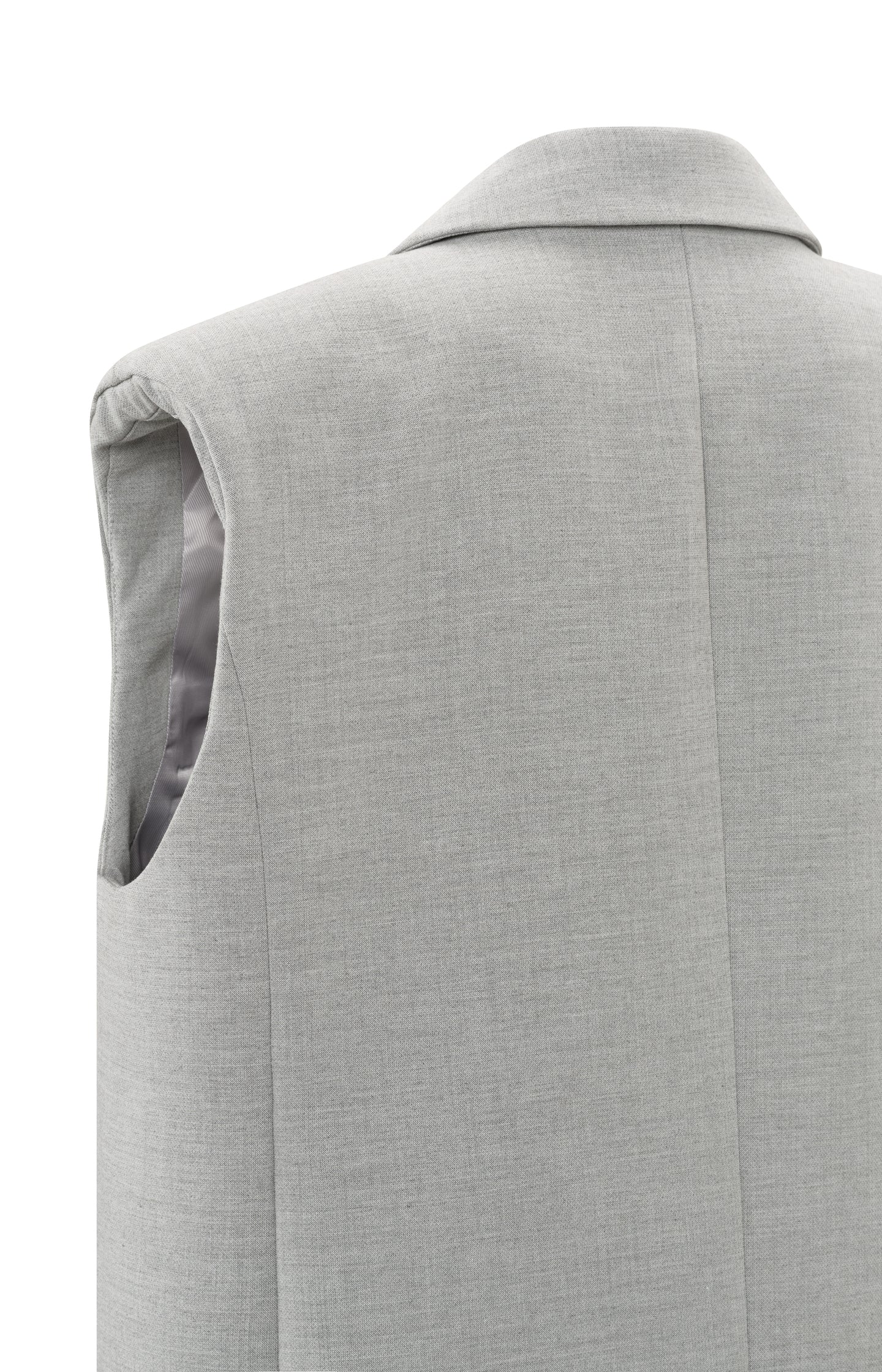 Sleeveless blazer with pockets, buttons and padded shoulders