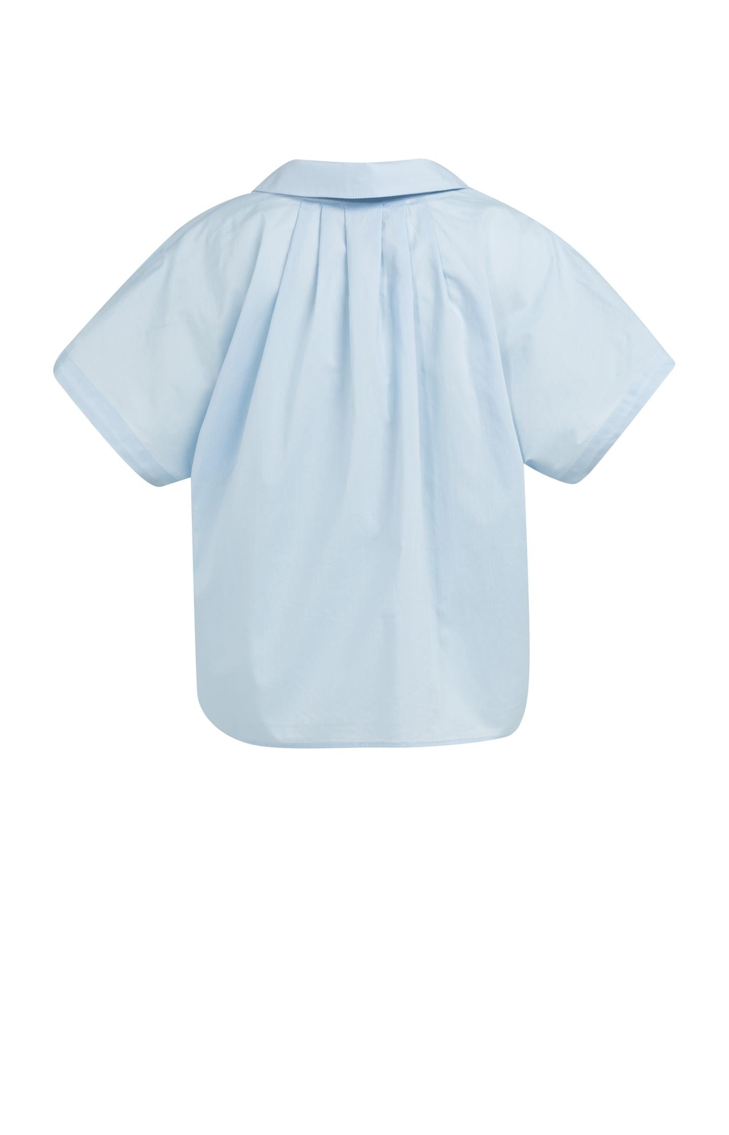 Sleeveless blouse with button details