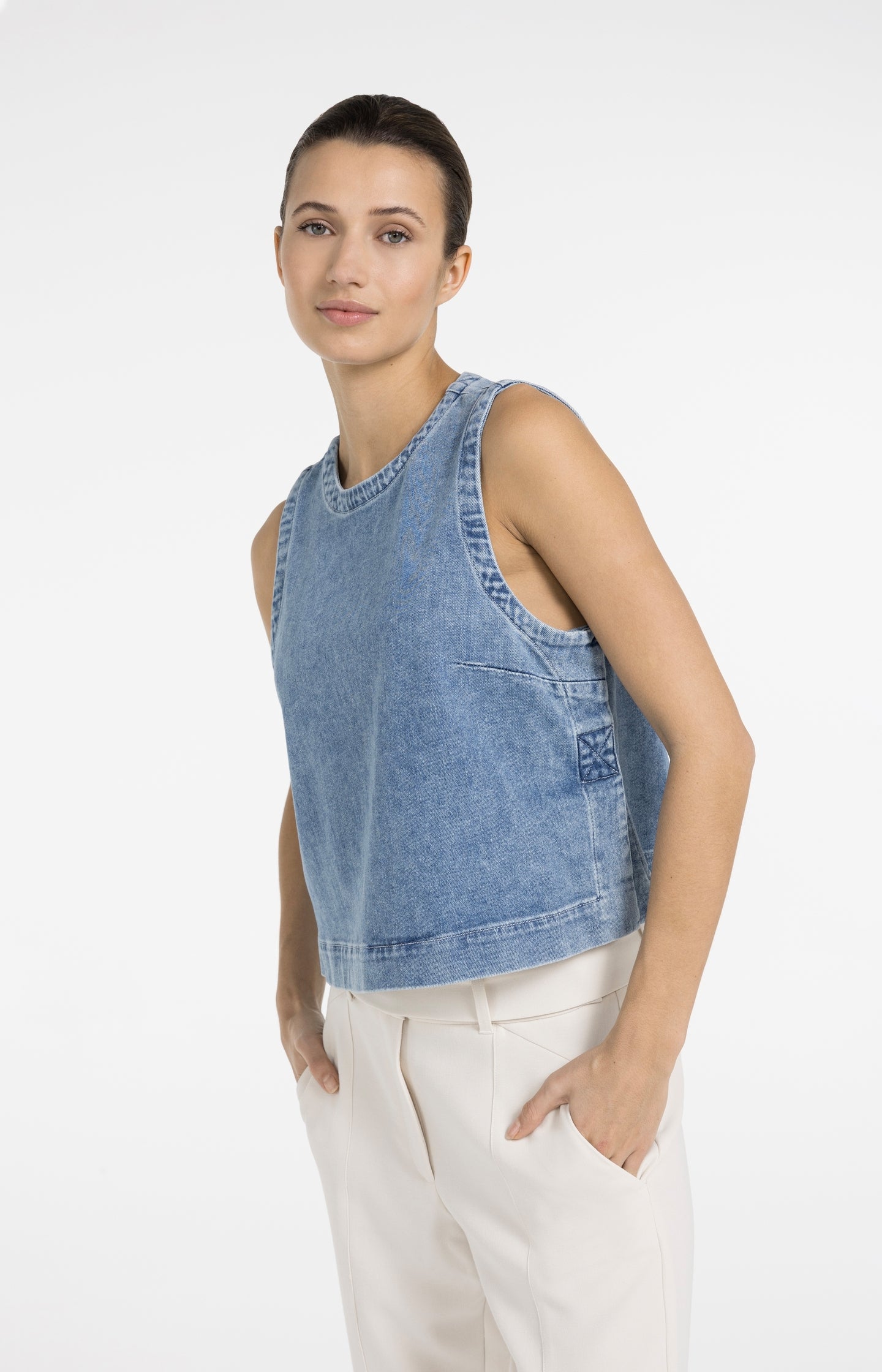 Sleeveless denim top with seam details