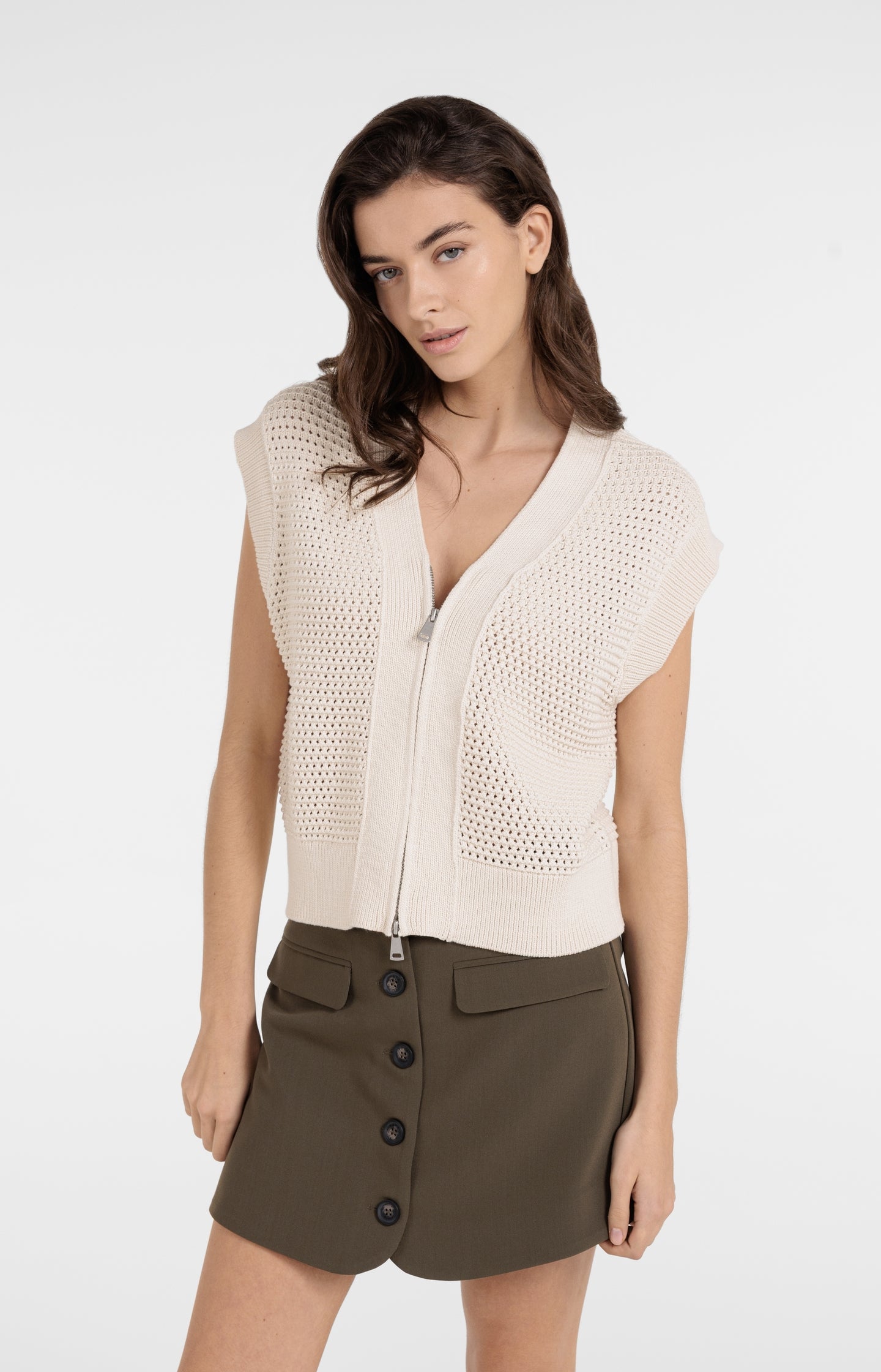 Sleeveless mesh knit cardigan with zipper closure