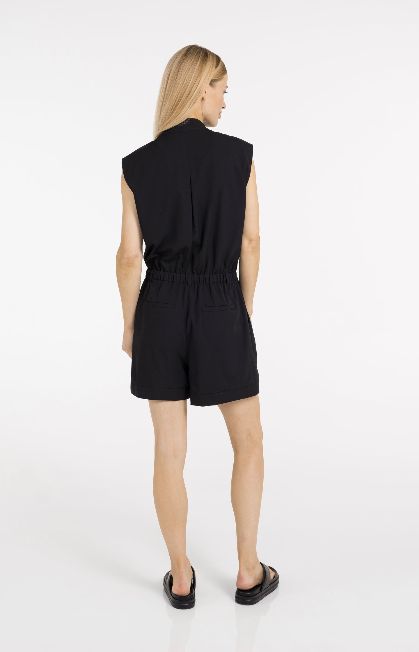 Sleeveless playsuit with wrap effect
