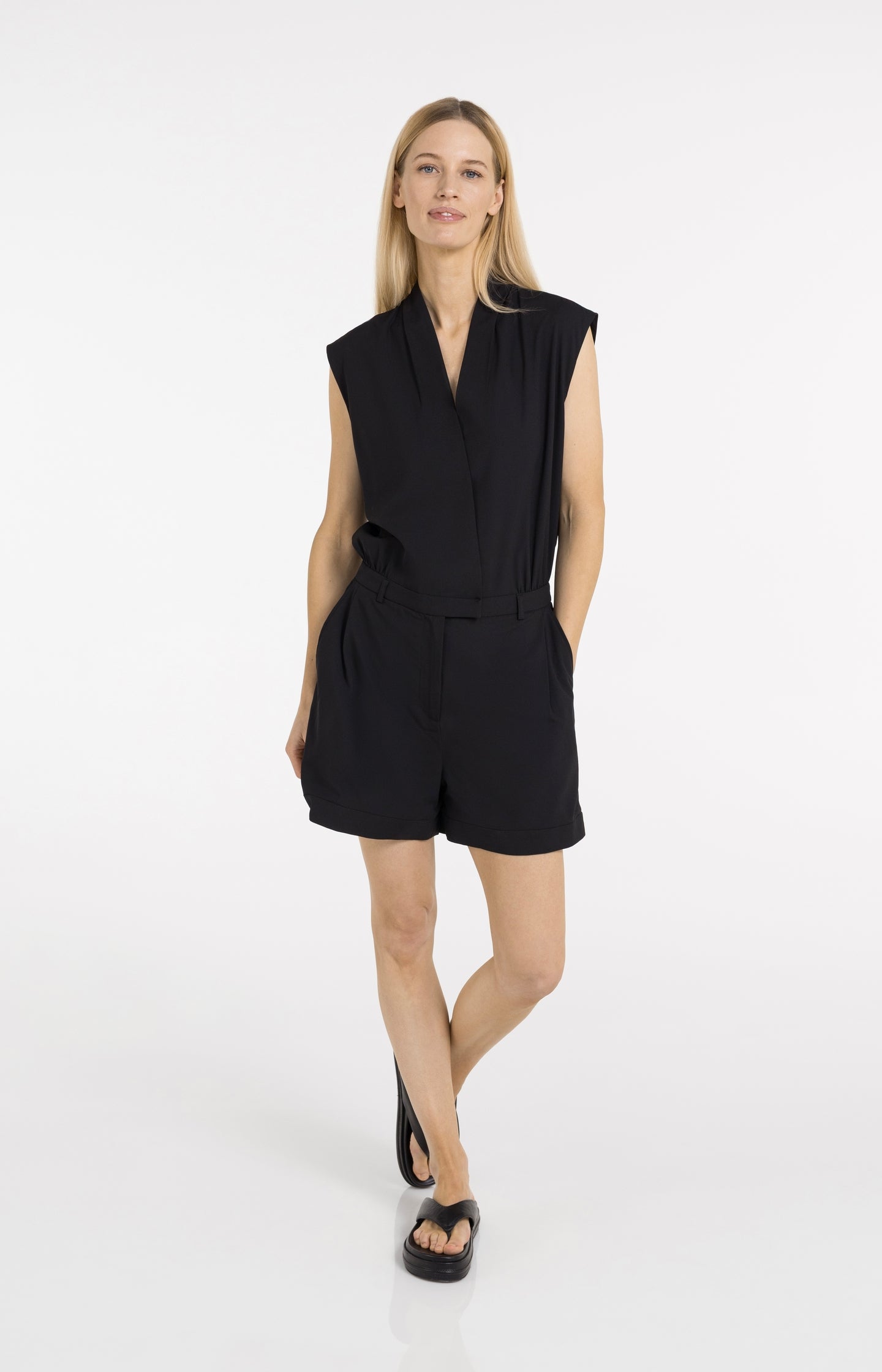 Sleeveless playsuit with wrap effect