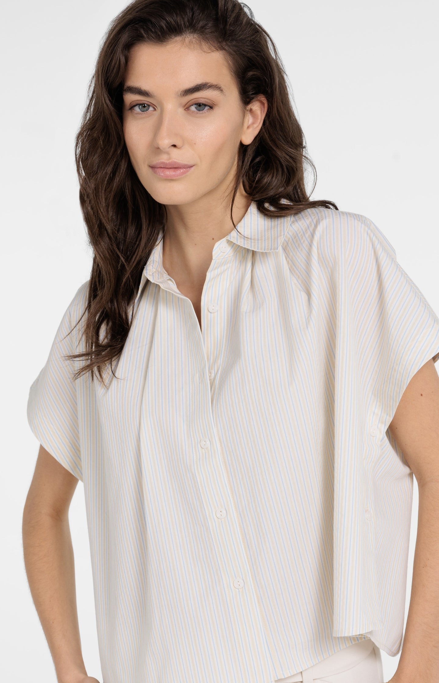 Sleeveless striped blouse with button detail