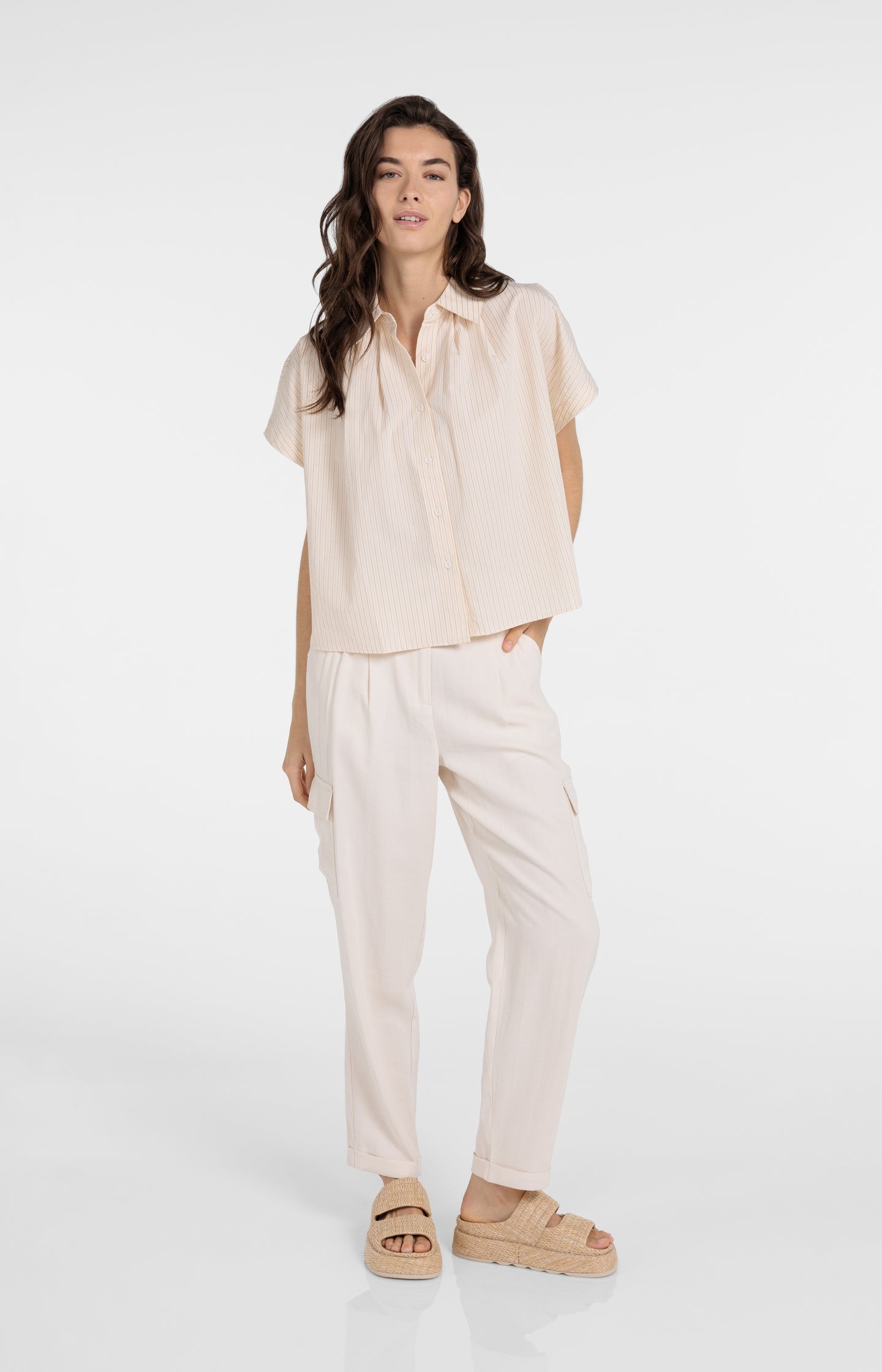 Sleeveless striped blouse with button detail