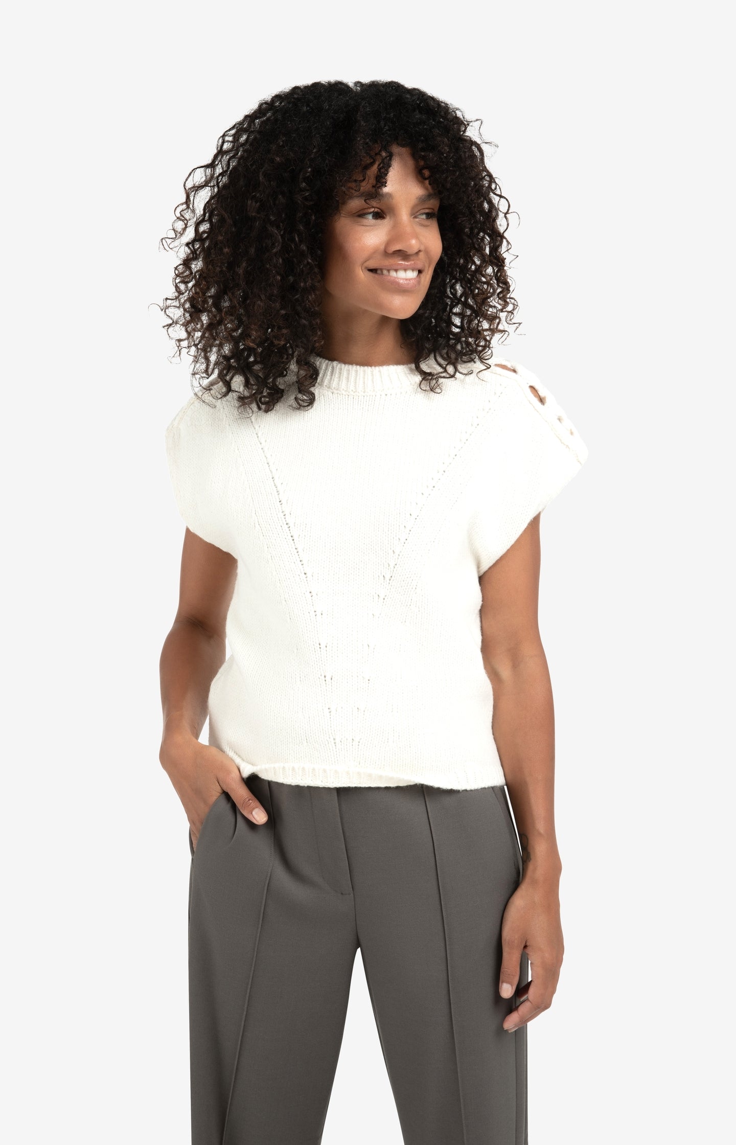 Sleeveless sweater with cable details on the shoulders