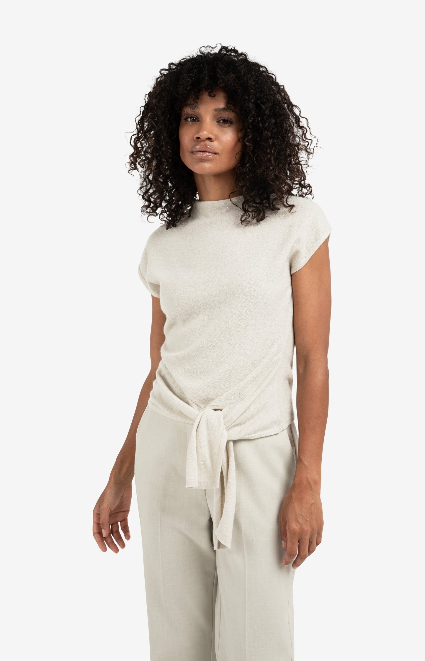 Sleeveless sweater with knot detail and subtle sequins