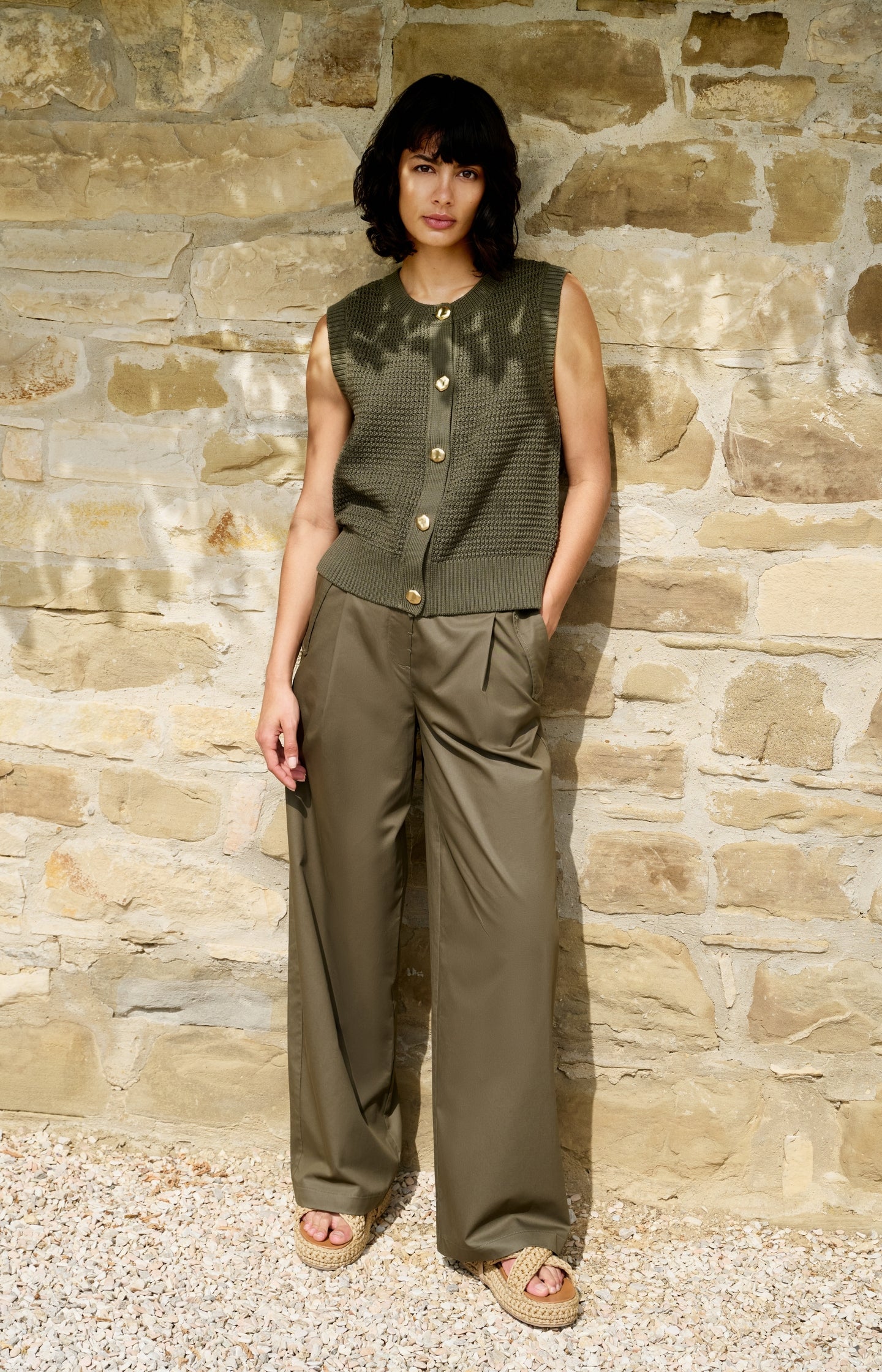 Sleeveless textured cardigan with gold-tone buttons