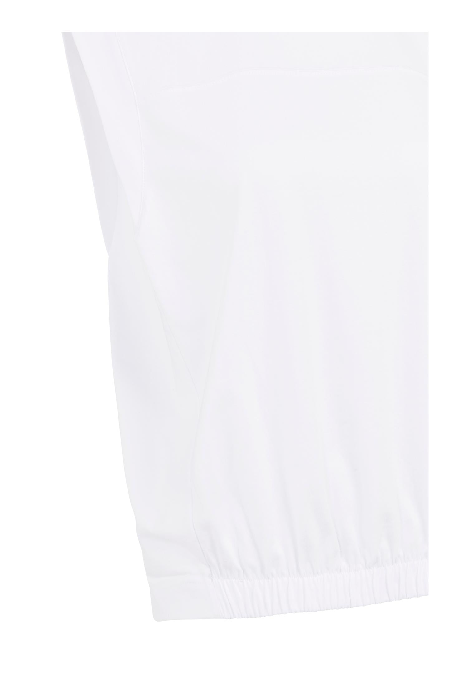 Sleeveless top with elastic hem