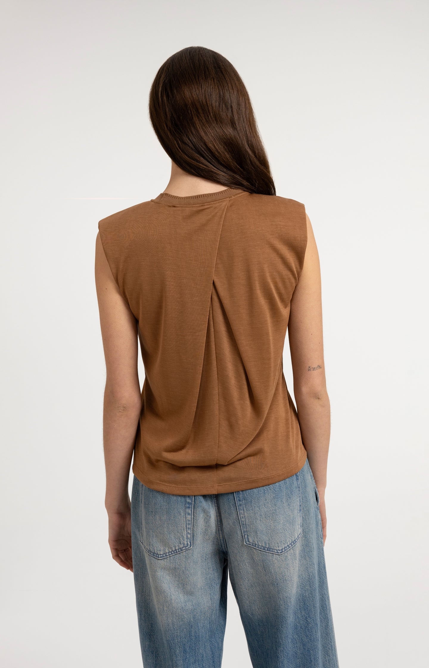 Sleeveless top with pleated neckline detail