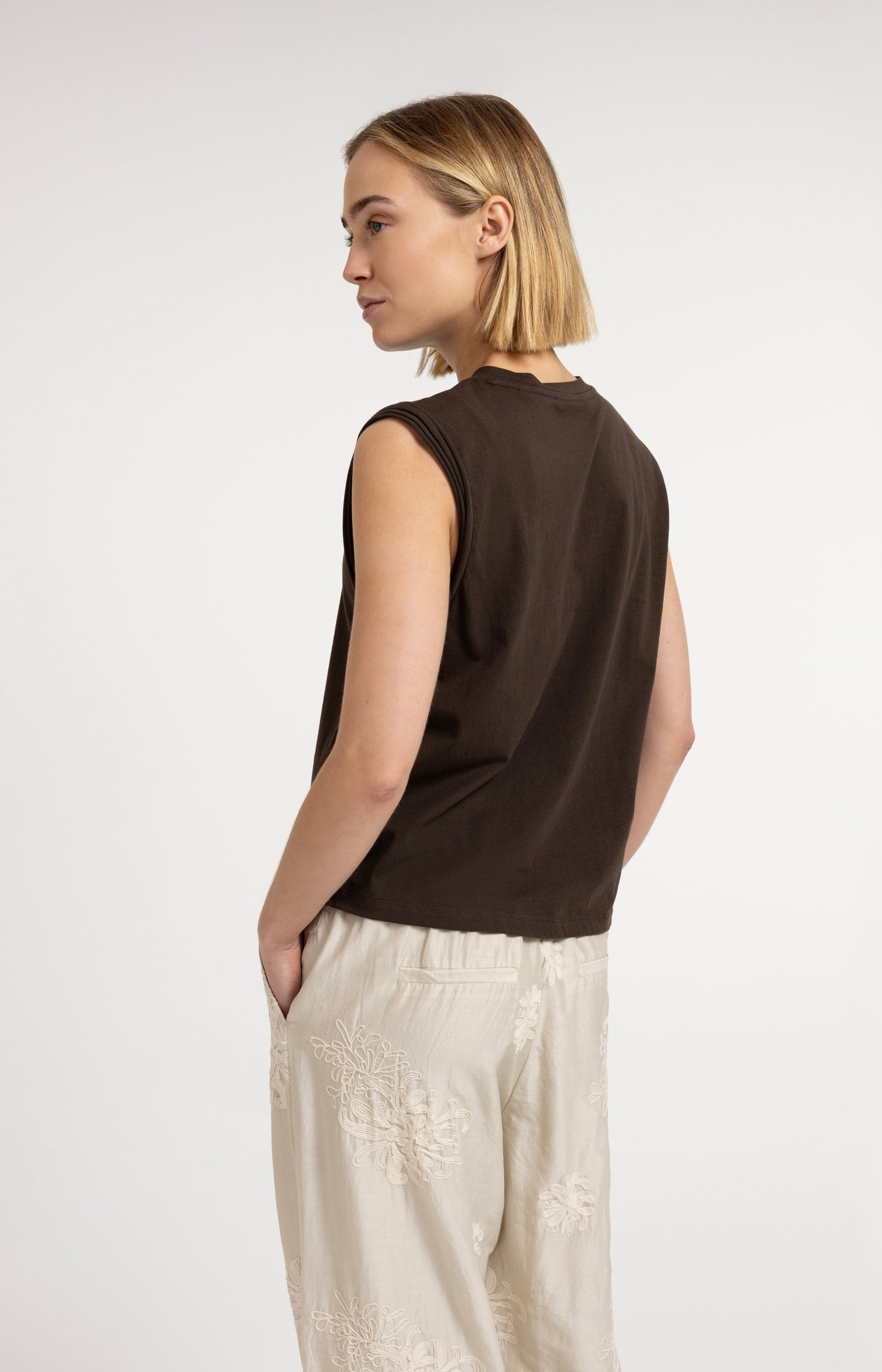 Sleeveless top with subtle sleeve details