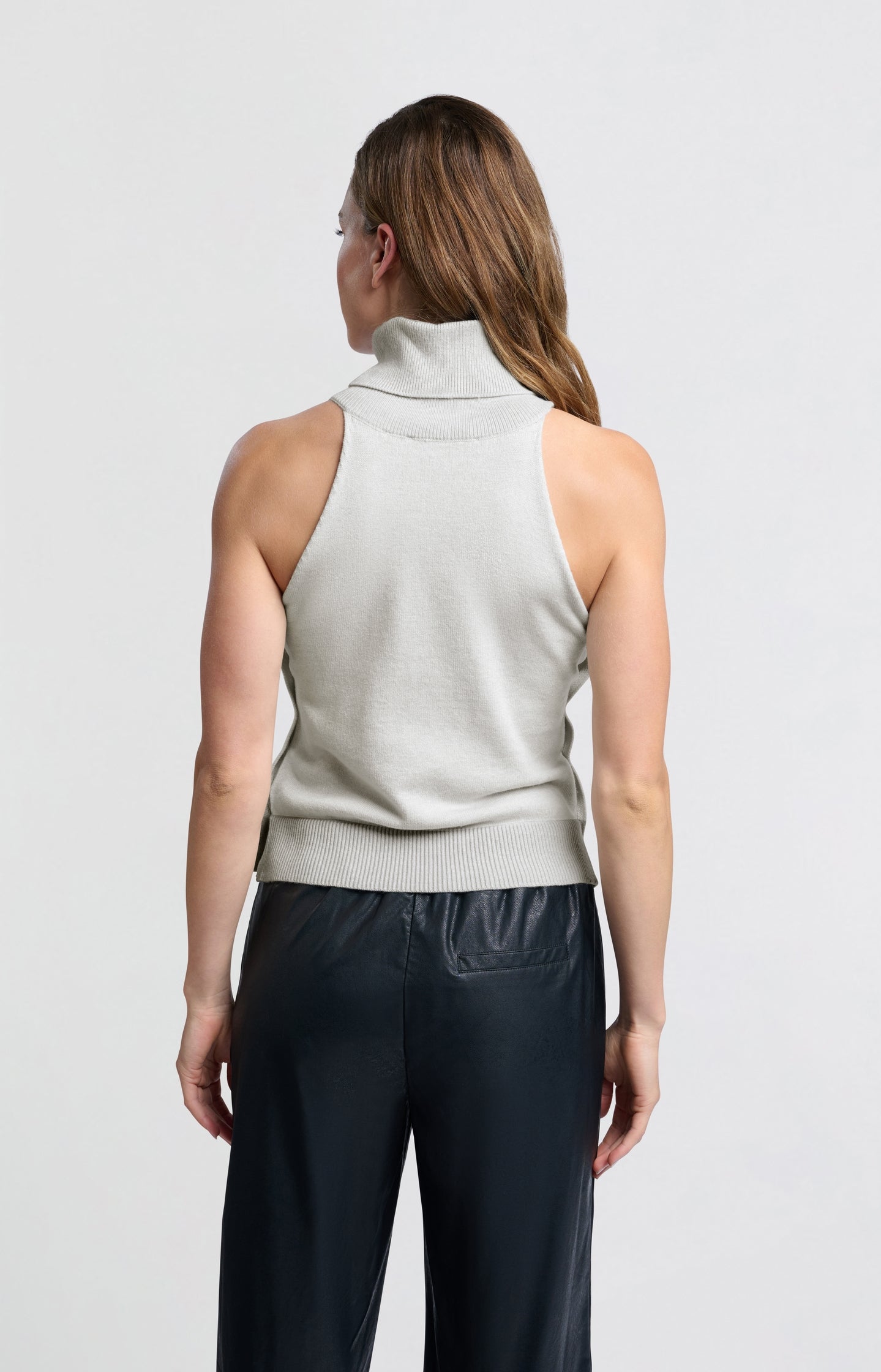 Sleeveless top with turtleneck and