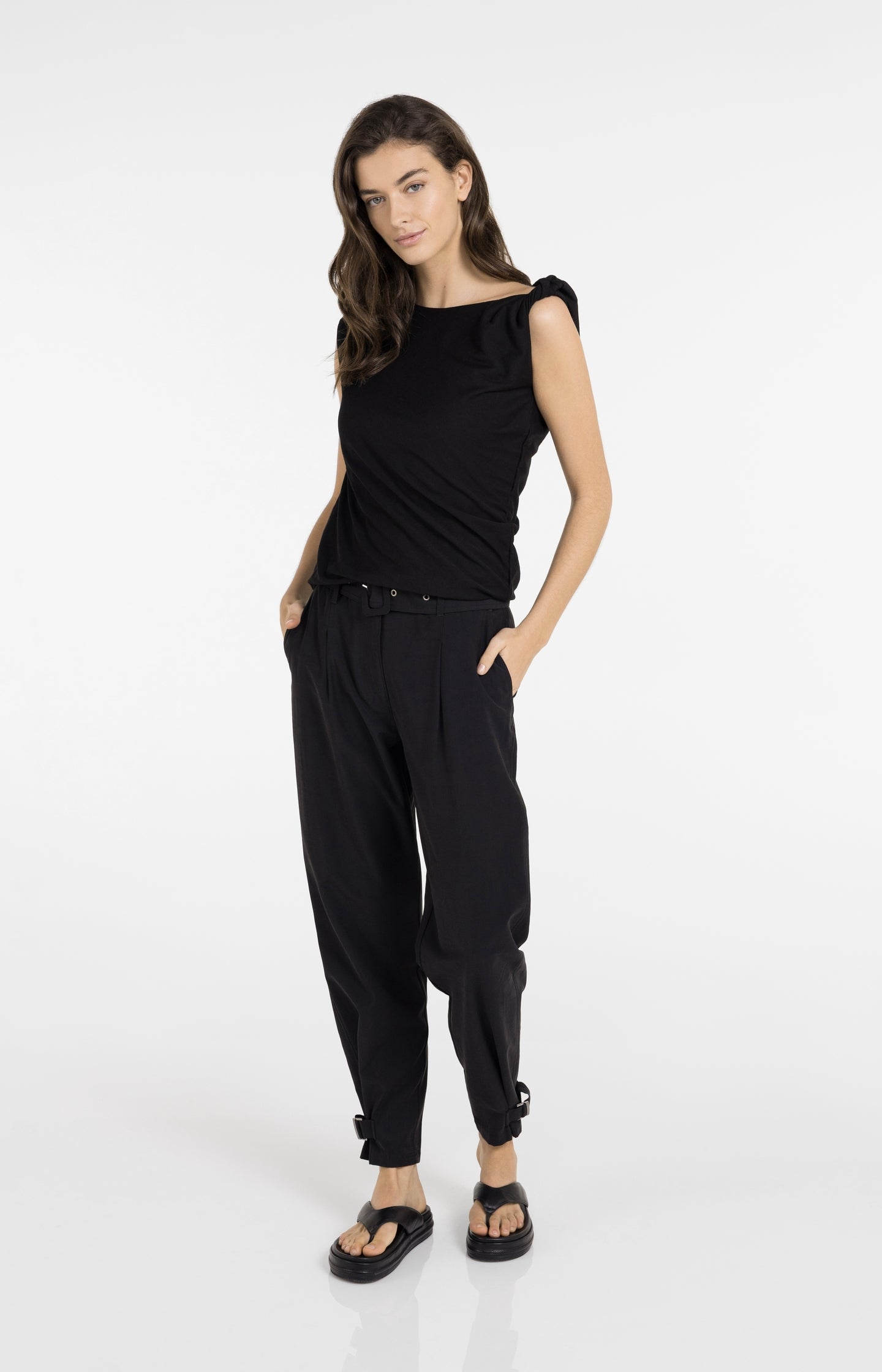 Sleeveless top with twisted shoulder detail