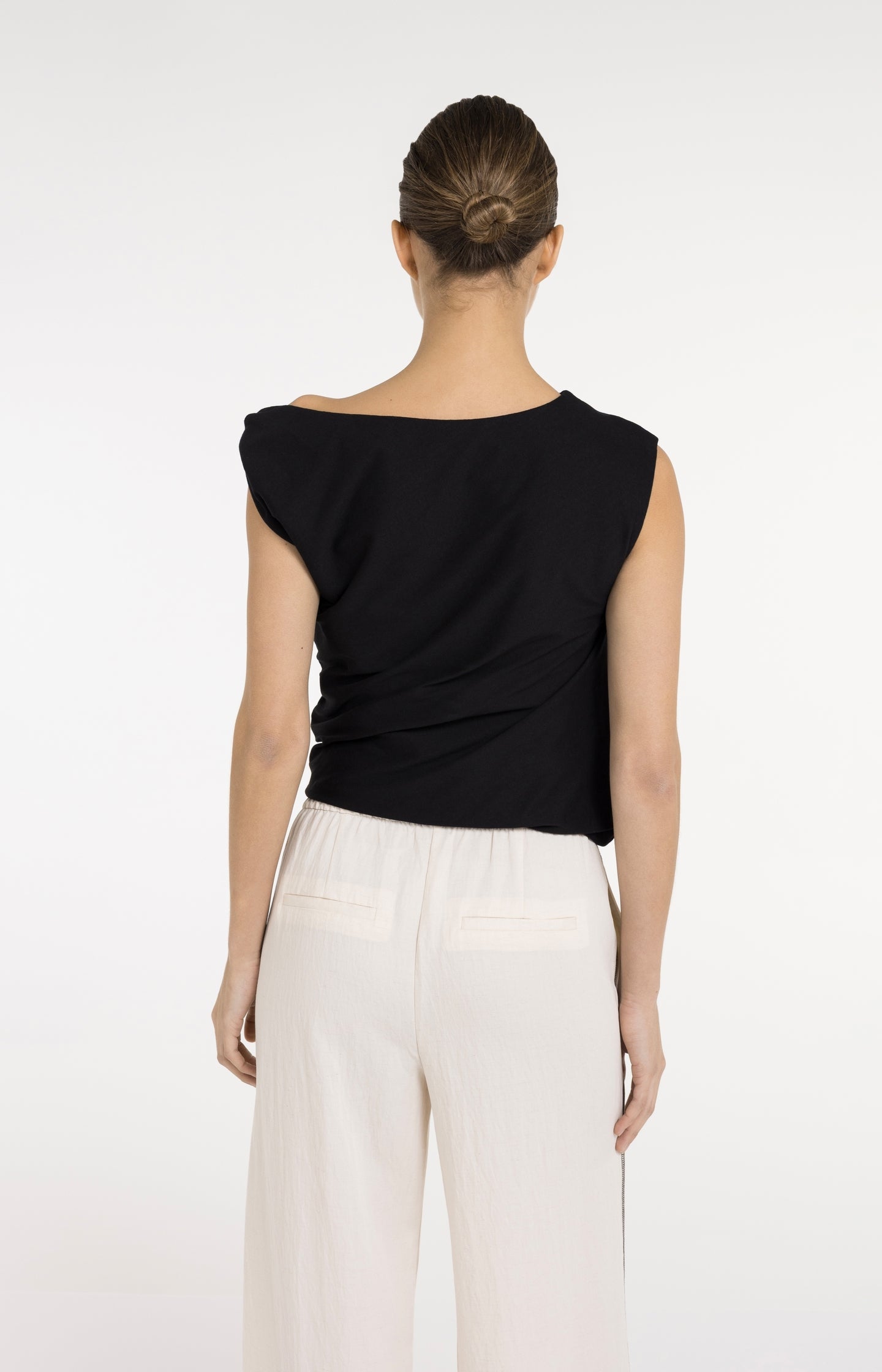 Sleeveless top with twisted shoulder detail