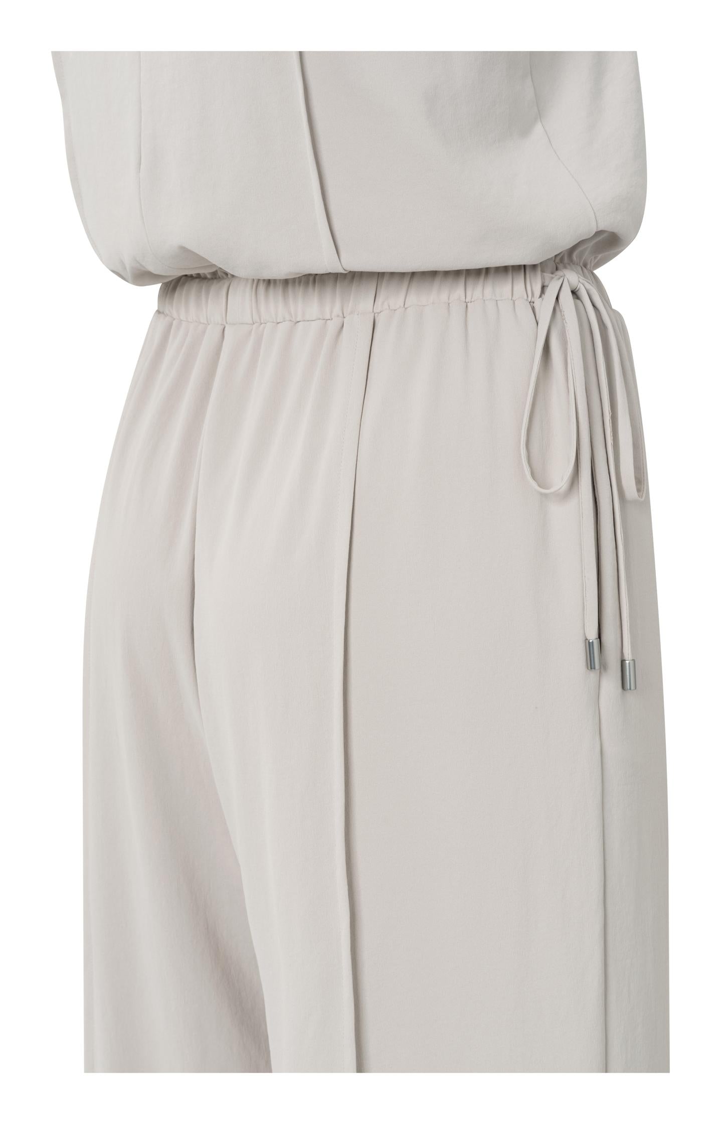 Sleeveless woven jumpsuit with cord detail