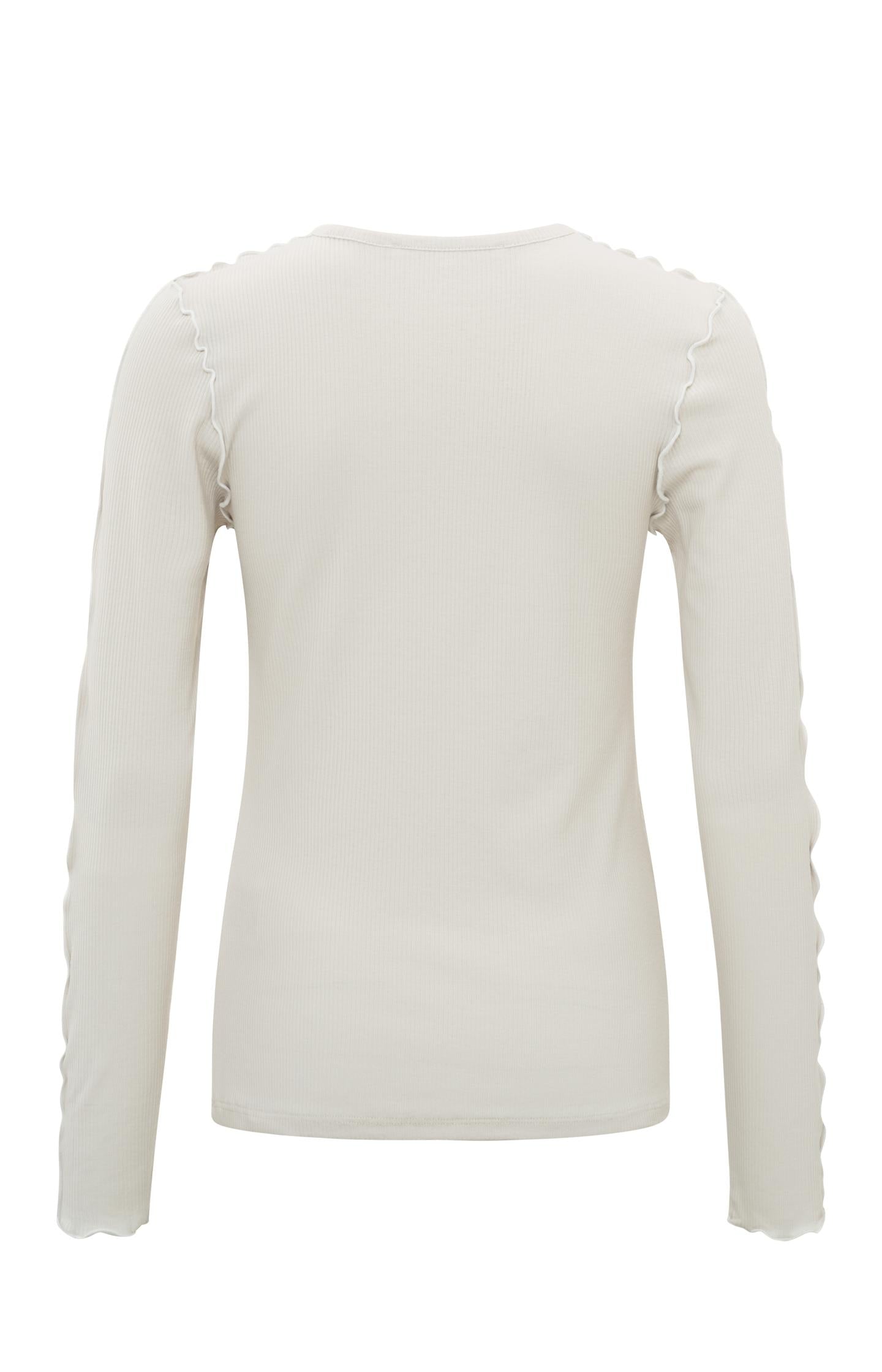 Slim fit top with round neck, long sleeves and frilled seams