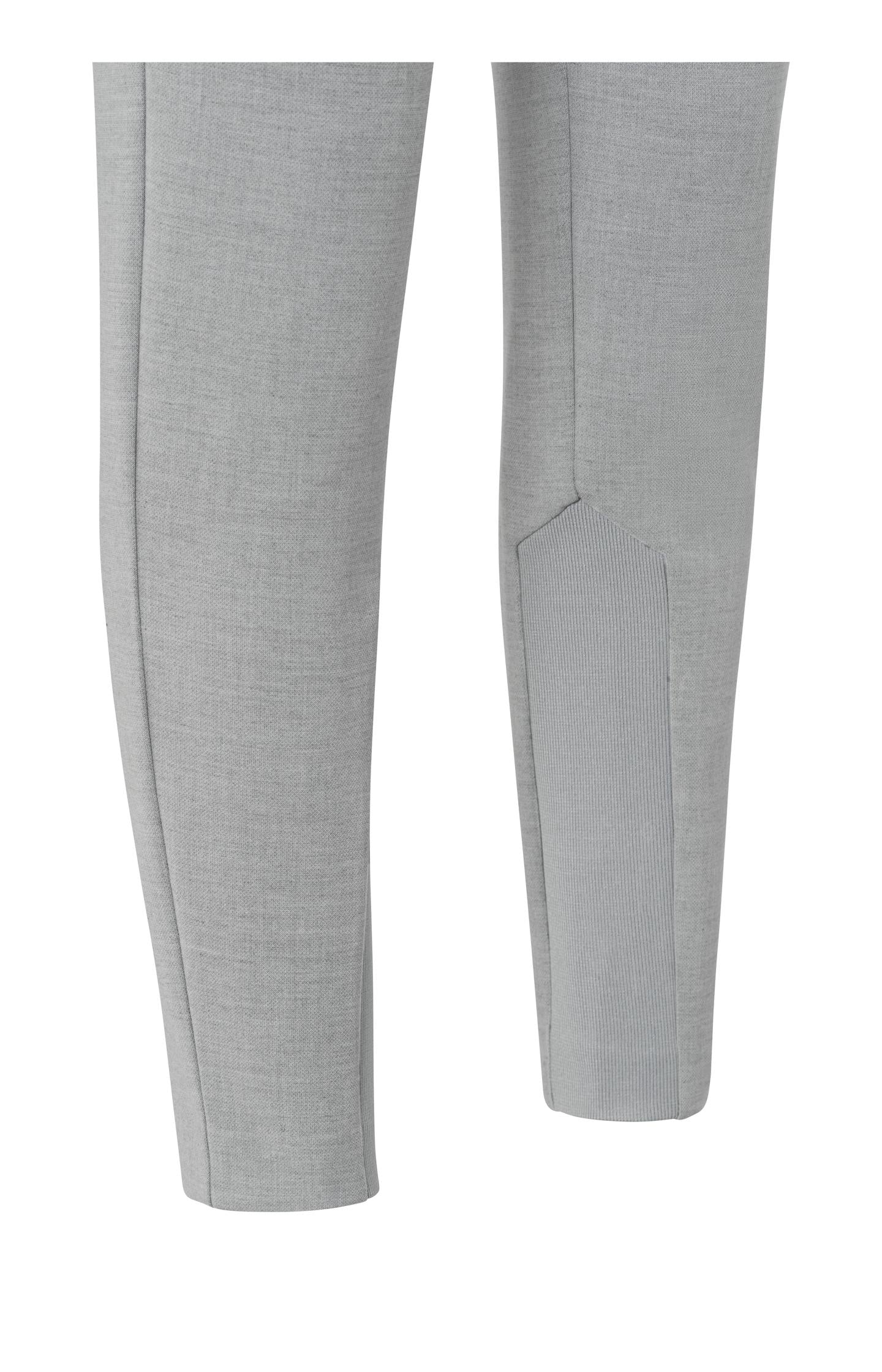 Slim fit trousers, with pockets, a zip fly and rib details