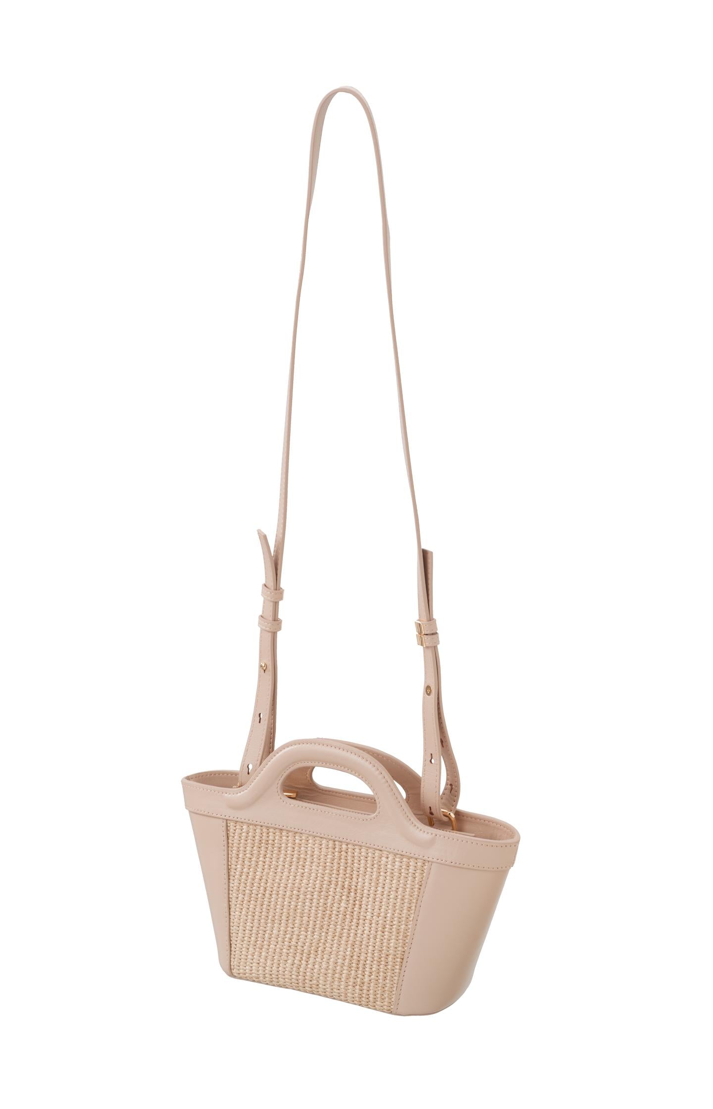 Small straw bag with leather handle