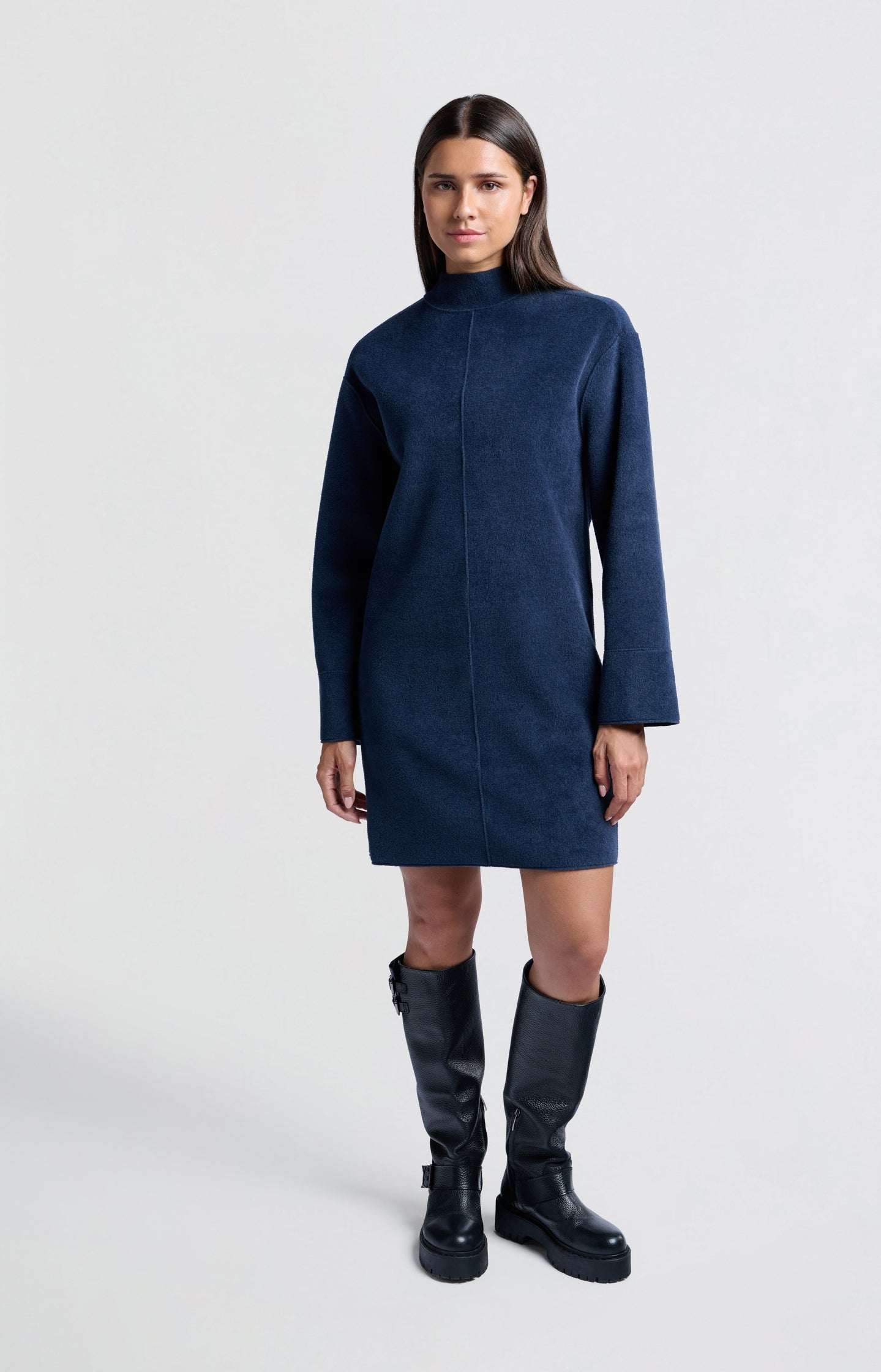 Soft dark blue dress with high neck and wide sleeves