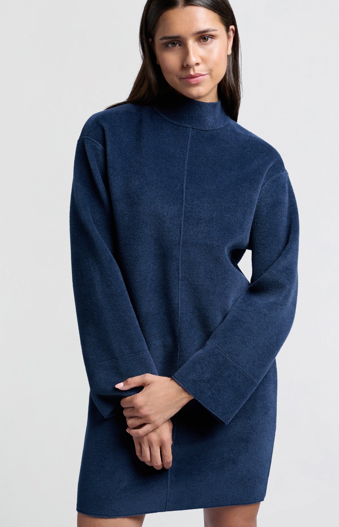 Soft dark blue dress with high neck and wide sleeves