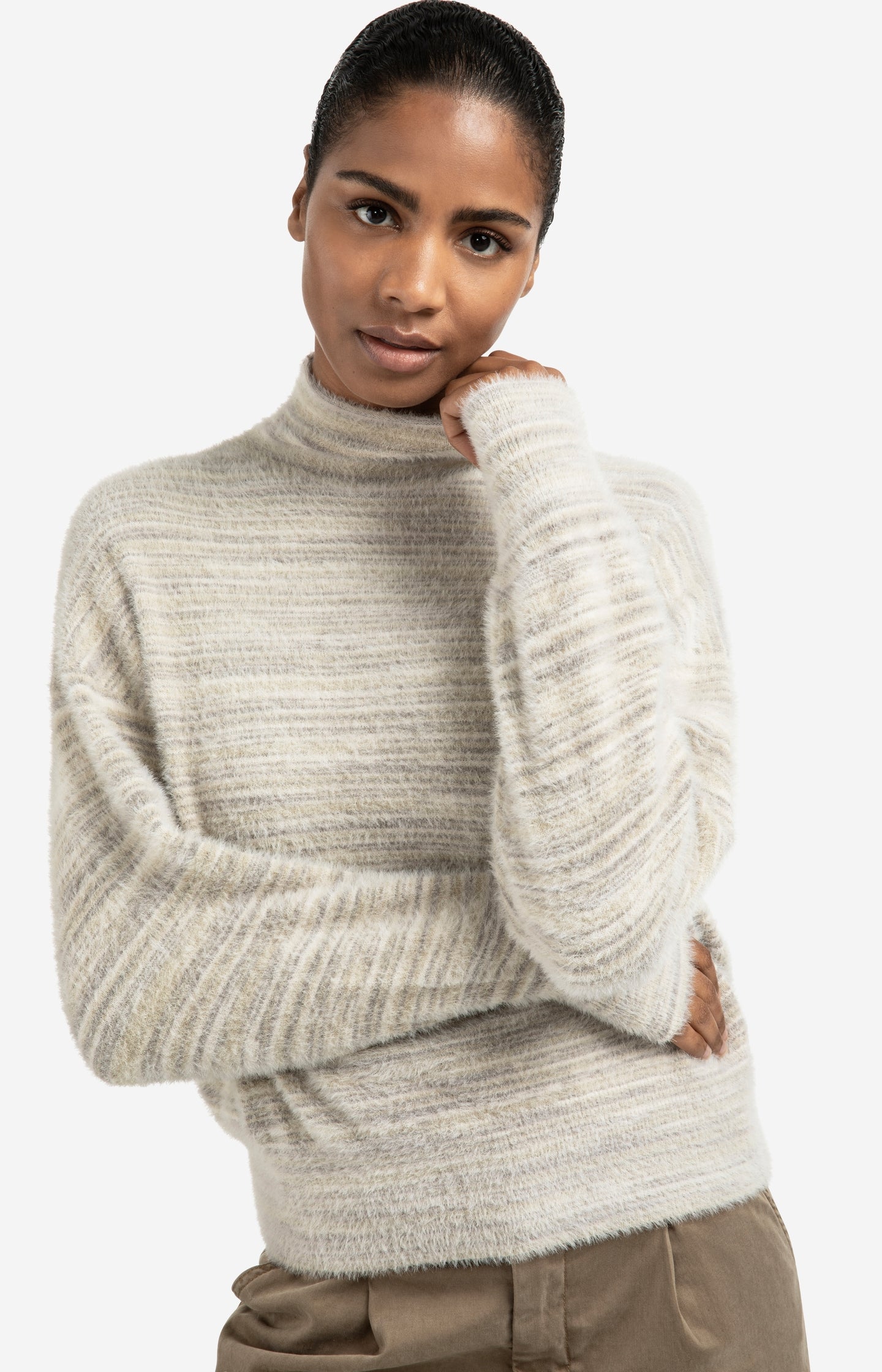 Soft fluffy sweater with turtleneck and subtle stripe mix