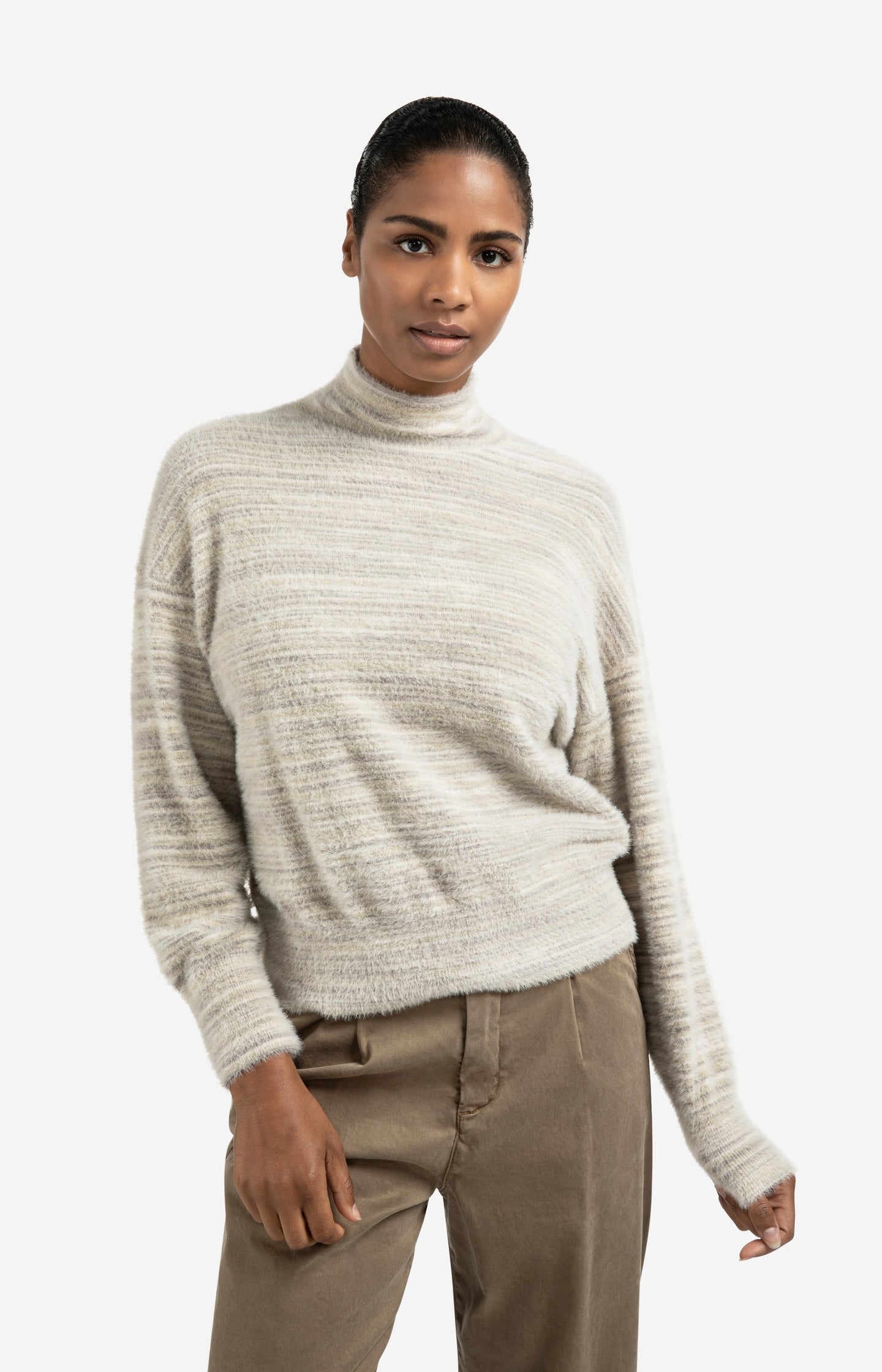 Soft fluffy sweater with turtleneck and subtle stripe mix