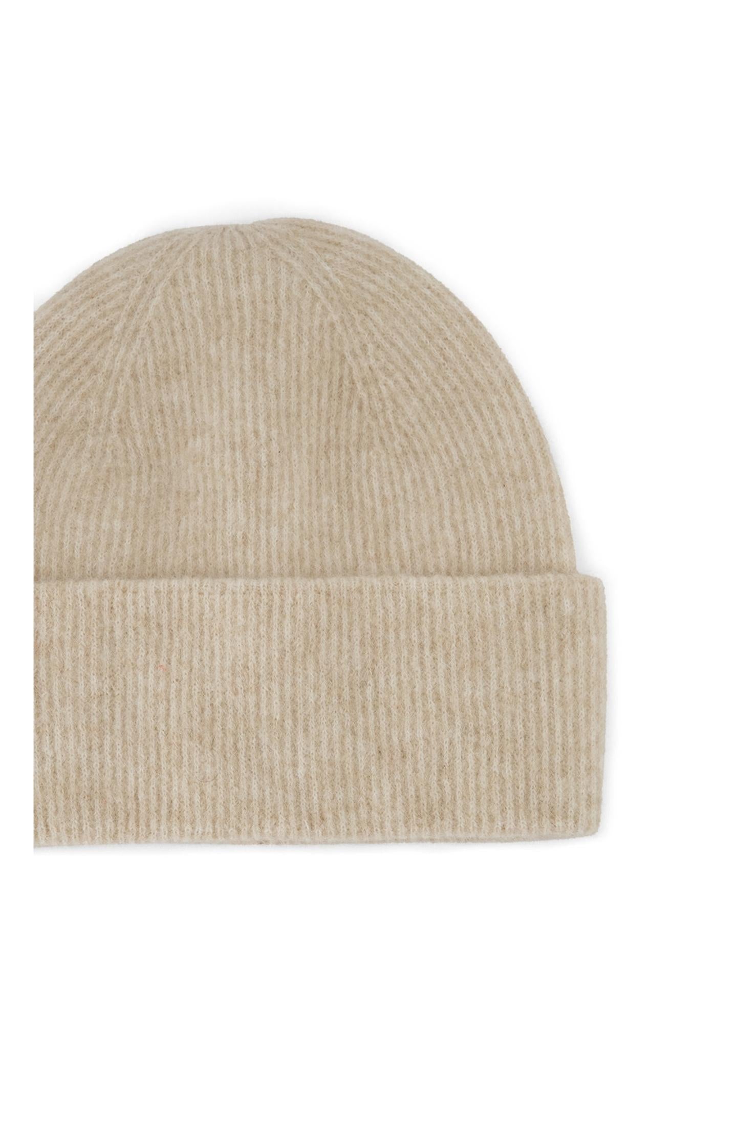 Soft hat made from comfortable material with turned-up edge