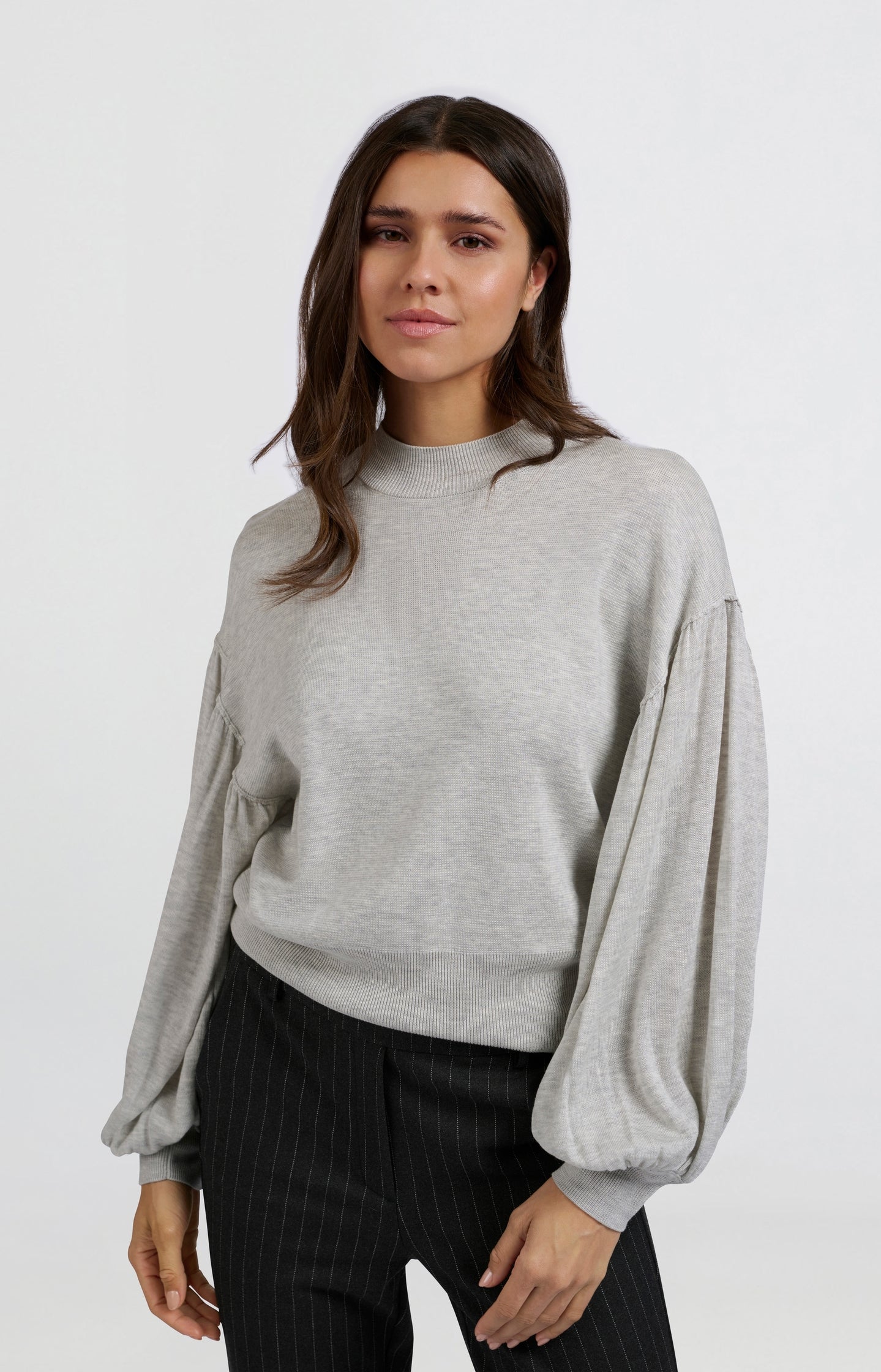 Soft oversized sweater with puff sleeves and a turtleneck