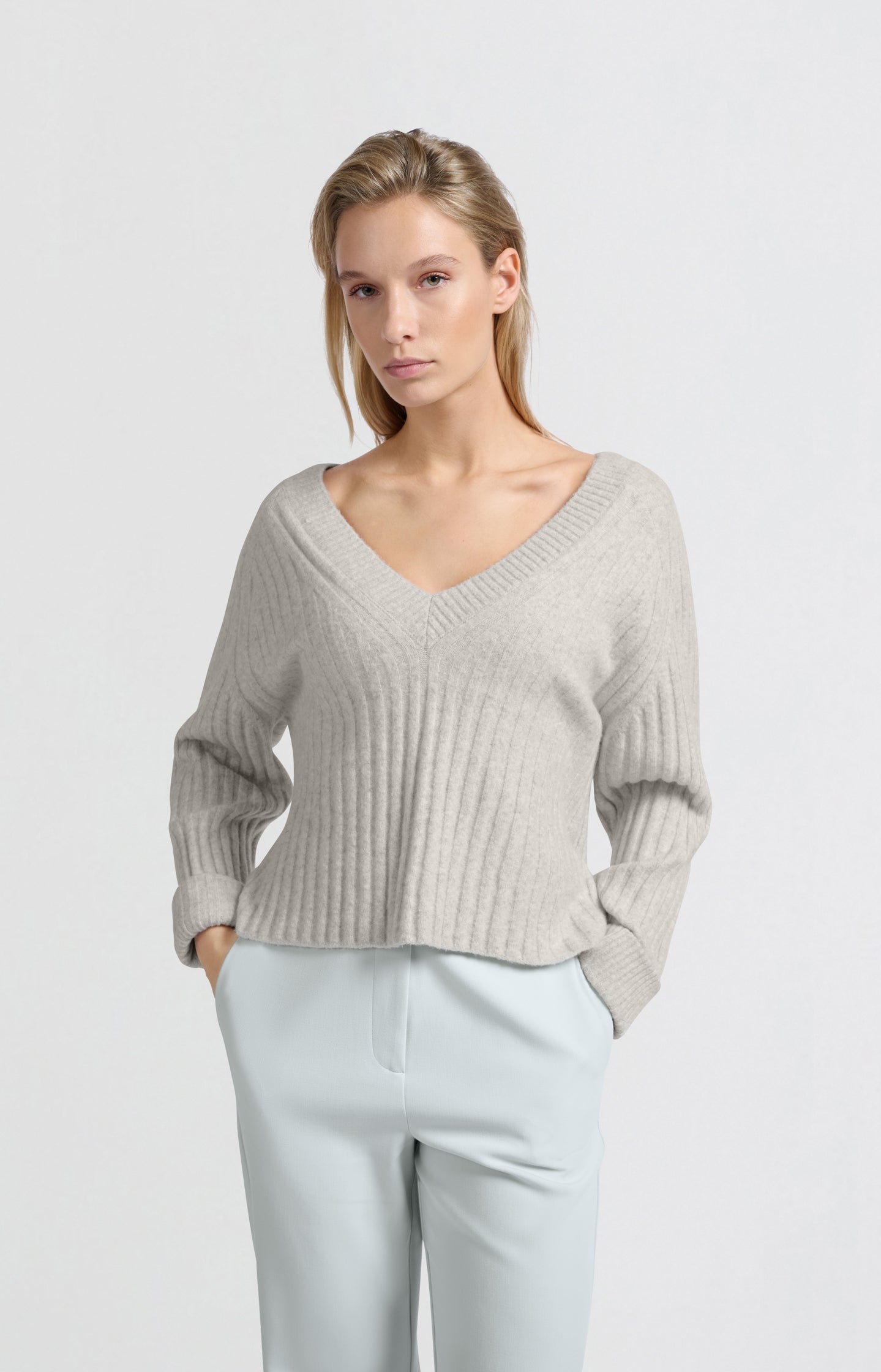 Soft ribbed sweater with V-neck and long sleeves